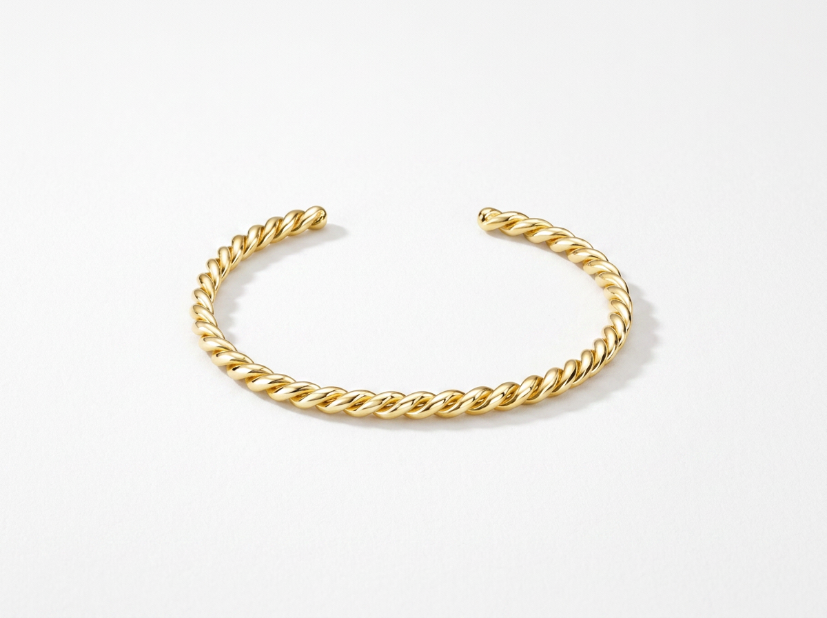 THE THICK GOLD TWIST BANGLE