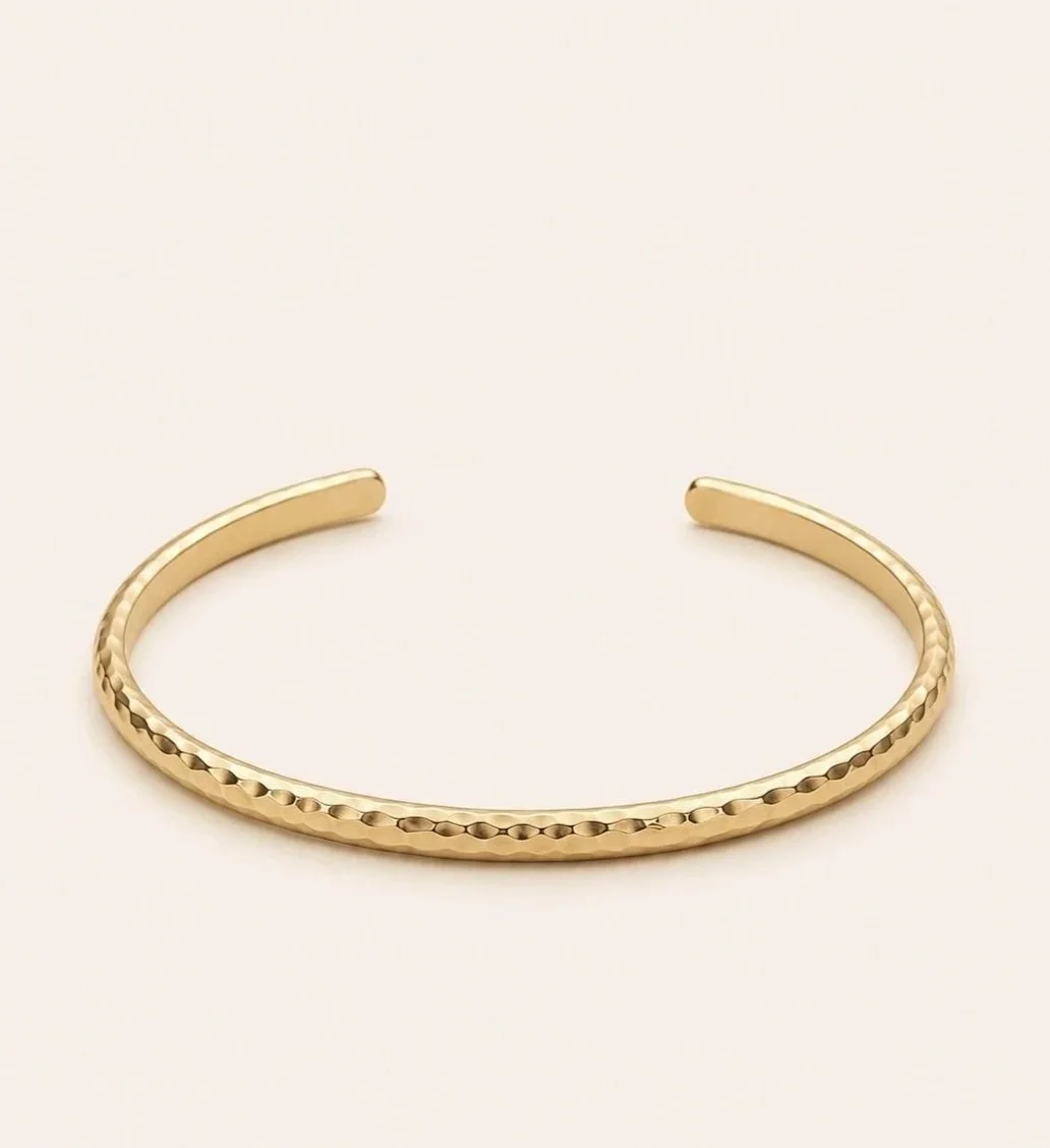 THE DAINTY GOLD HAMMERED FLAT BANGLE