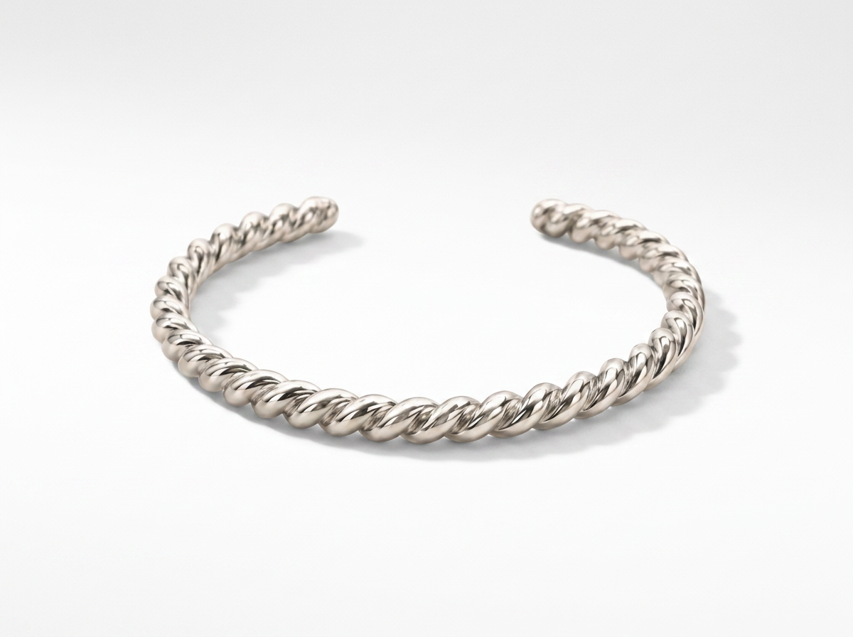 THE THICK SILVER TWIST BANGLE