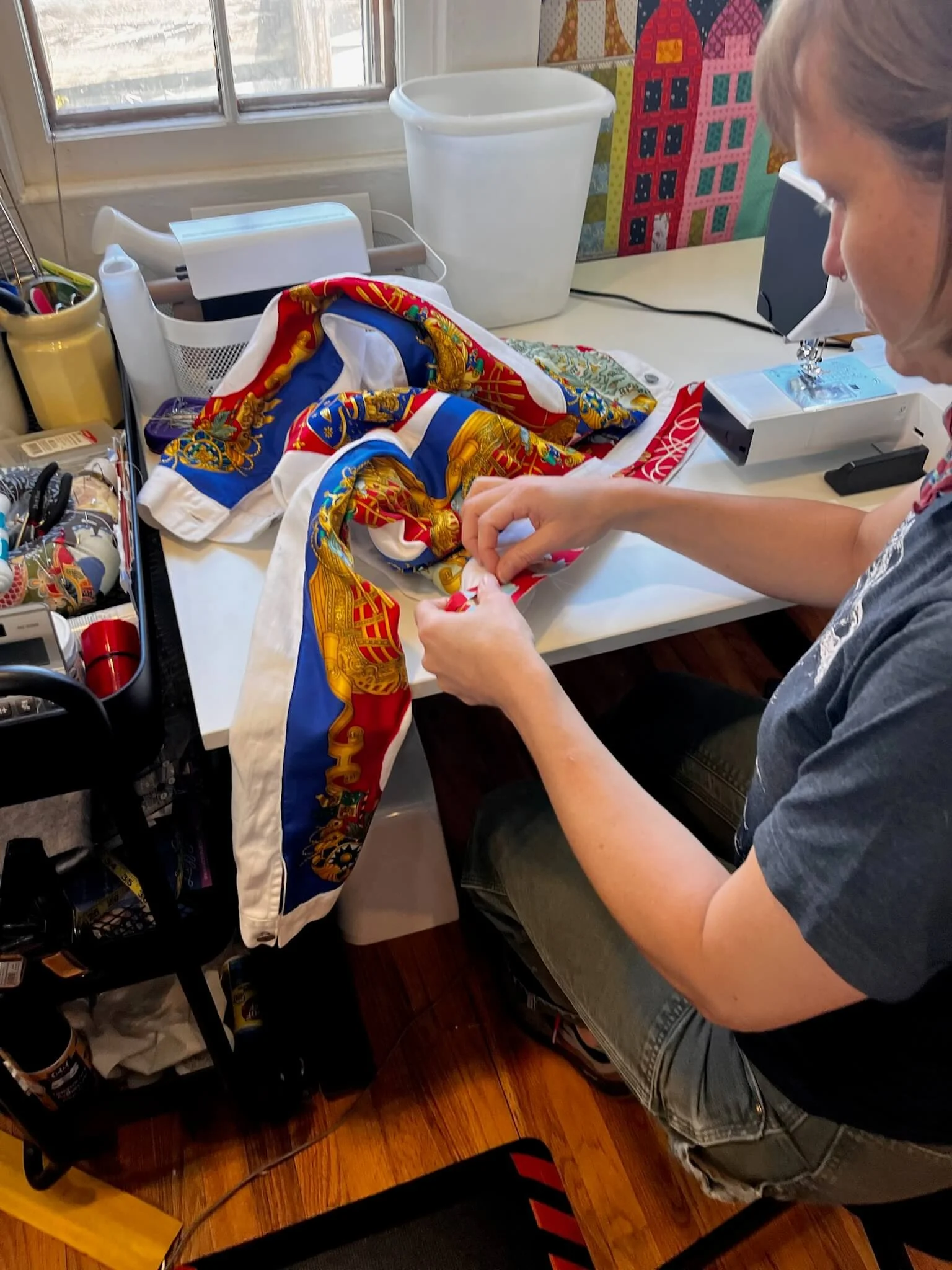 Janette hand stitching at sewing machine