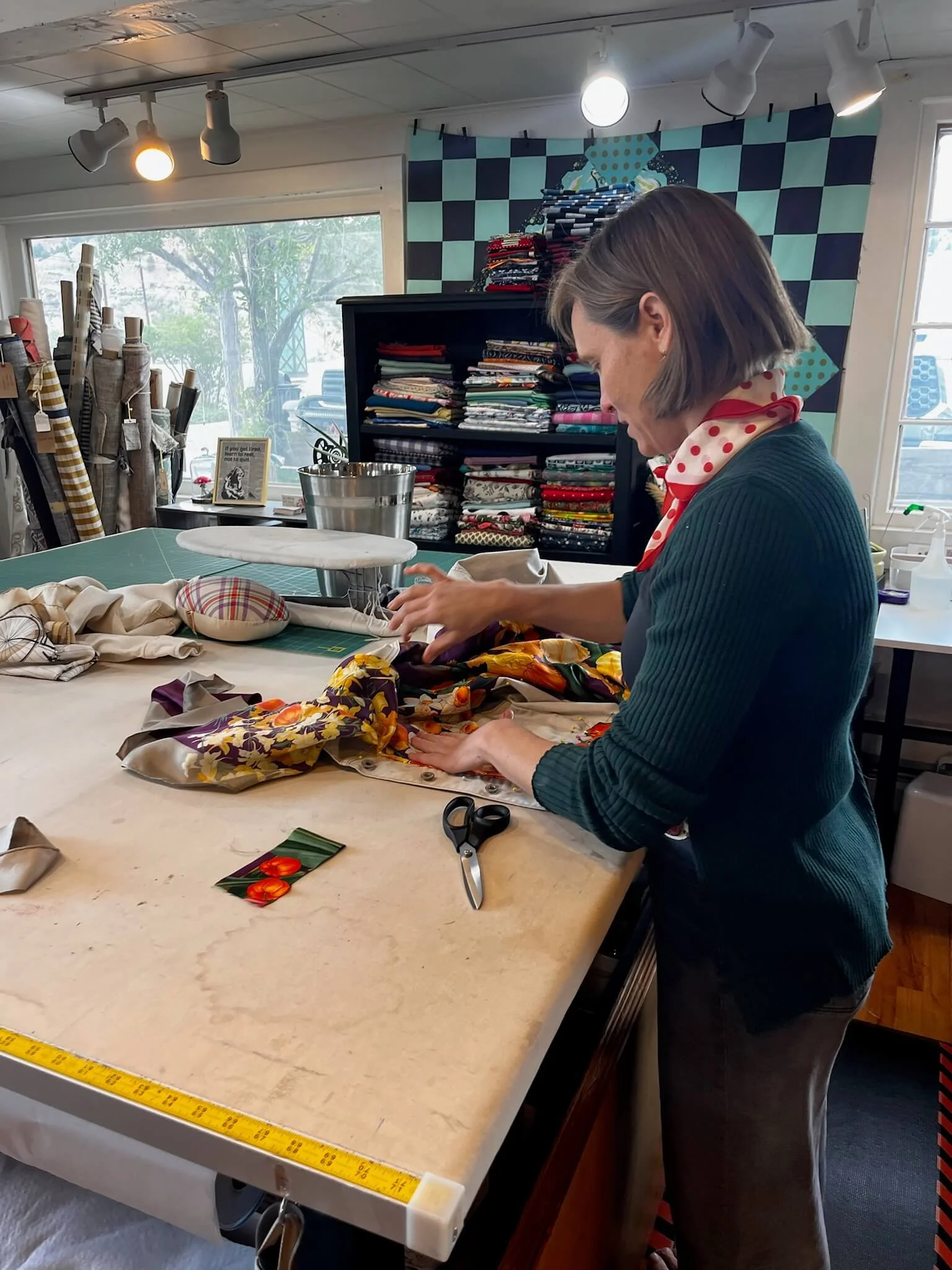 Seamsrtress placing fabric