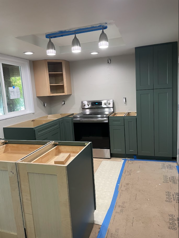Green Cabinets with Natural Wood