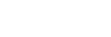 Text reading "the Blue Breeze inn" with a stylized swirly line above the text.