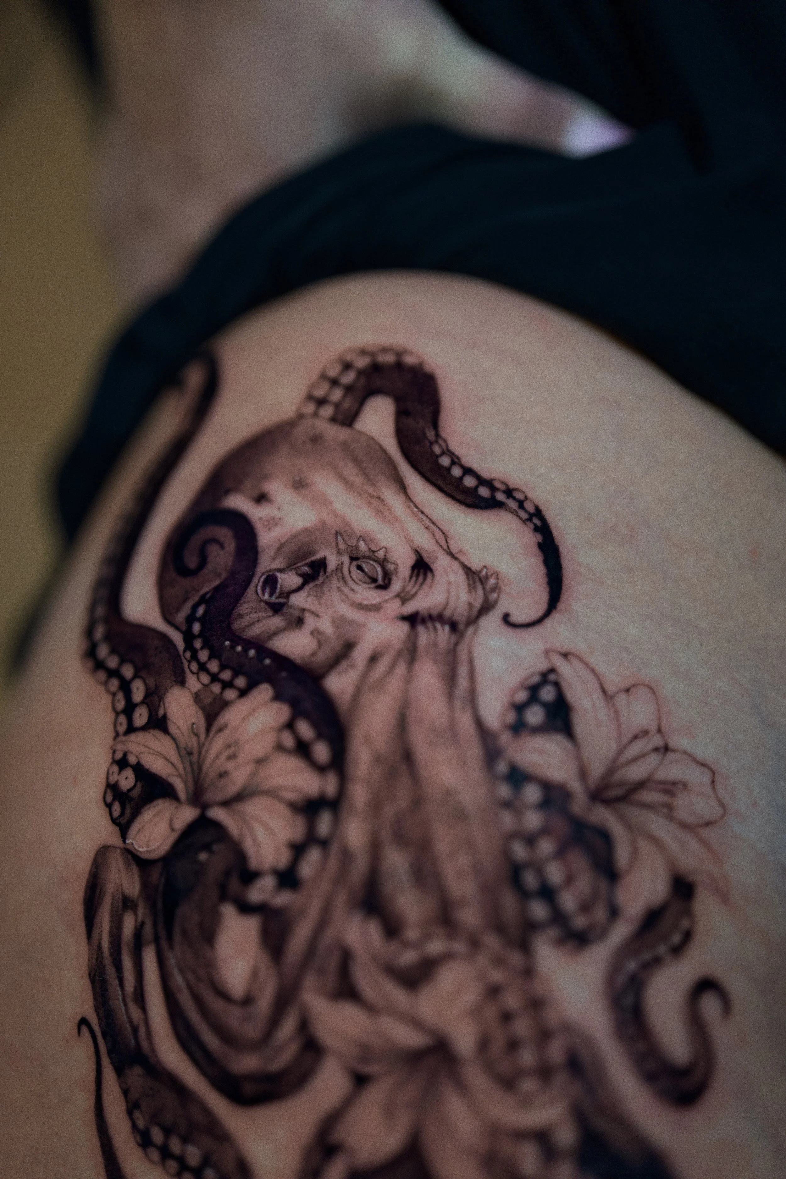 Illustrative Octopus Thigh Tattoo Head Close Up