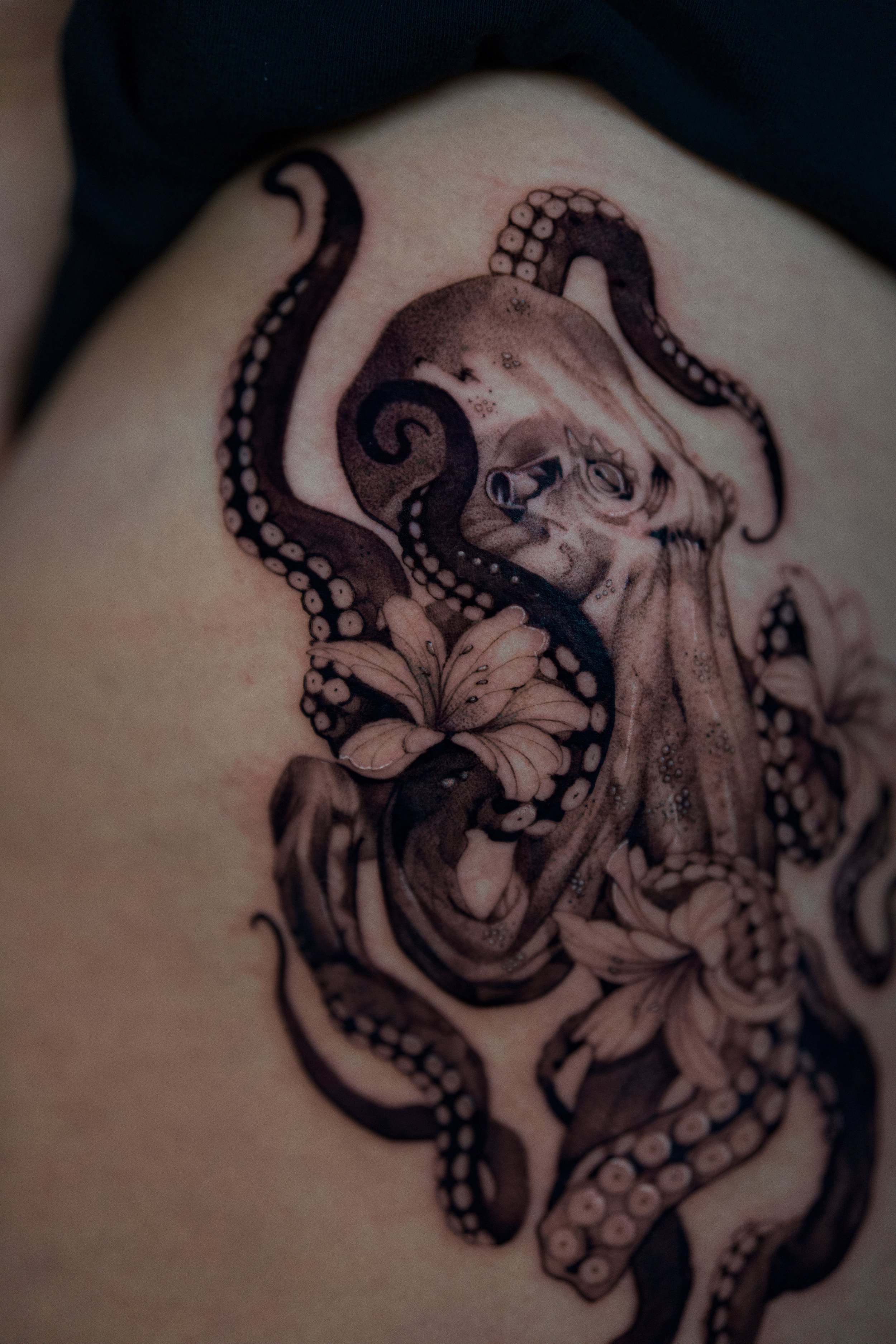 Illustrative Octopus Thigh Tattoo Head Close Up