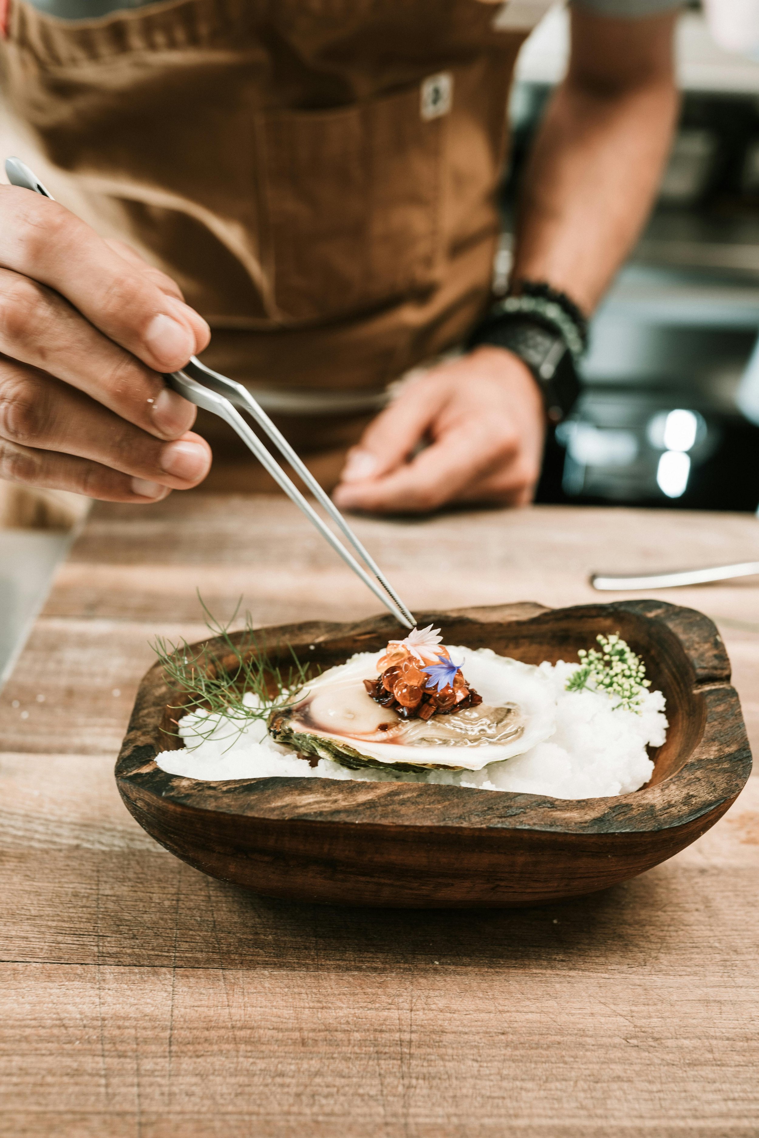 Luxury culinary travel experience featuring gourmet seafood tasting curated by The Three’s Club