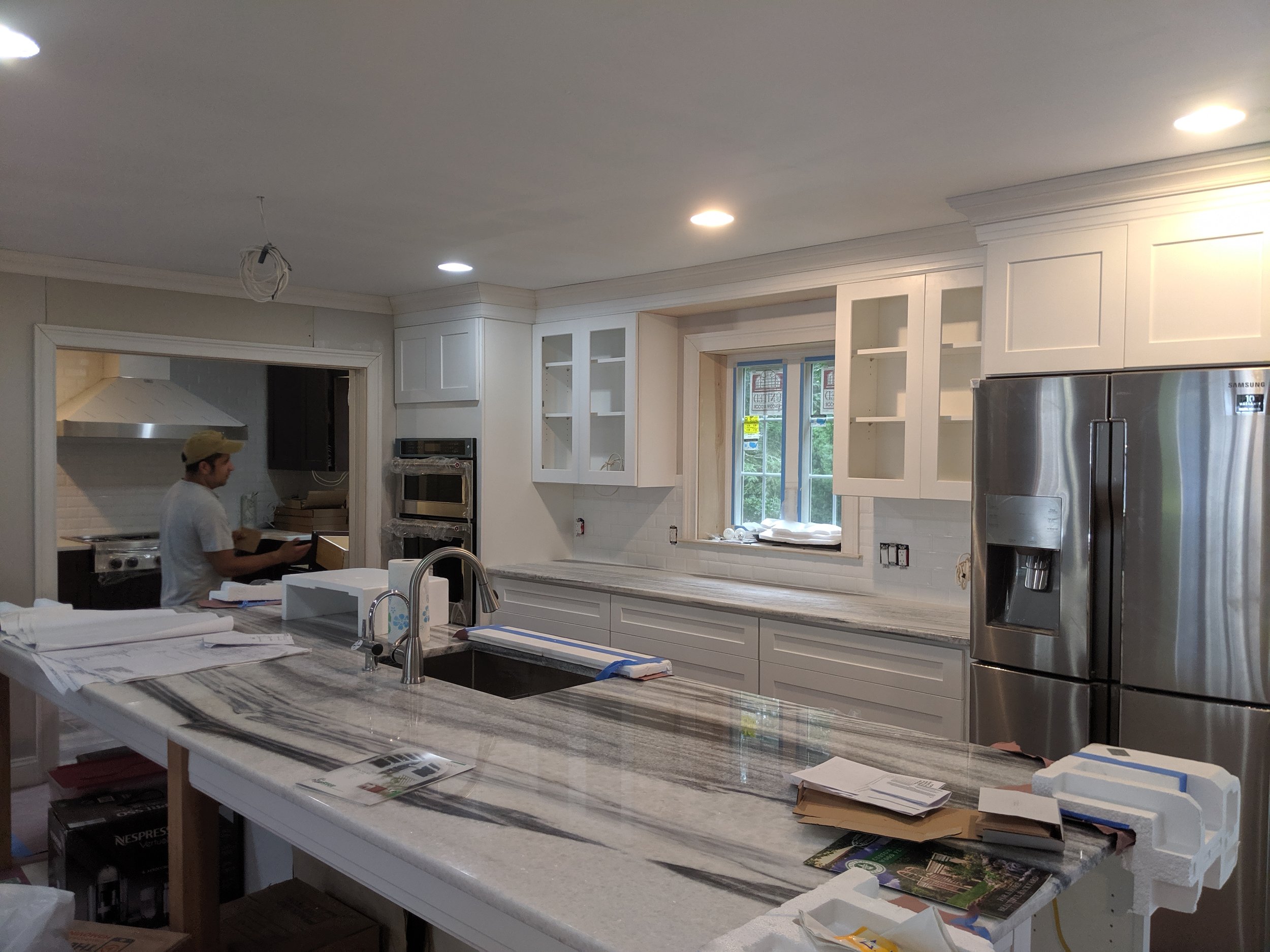 Oranssi carpenter using bench saw