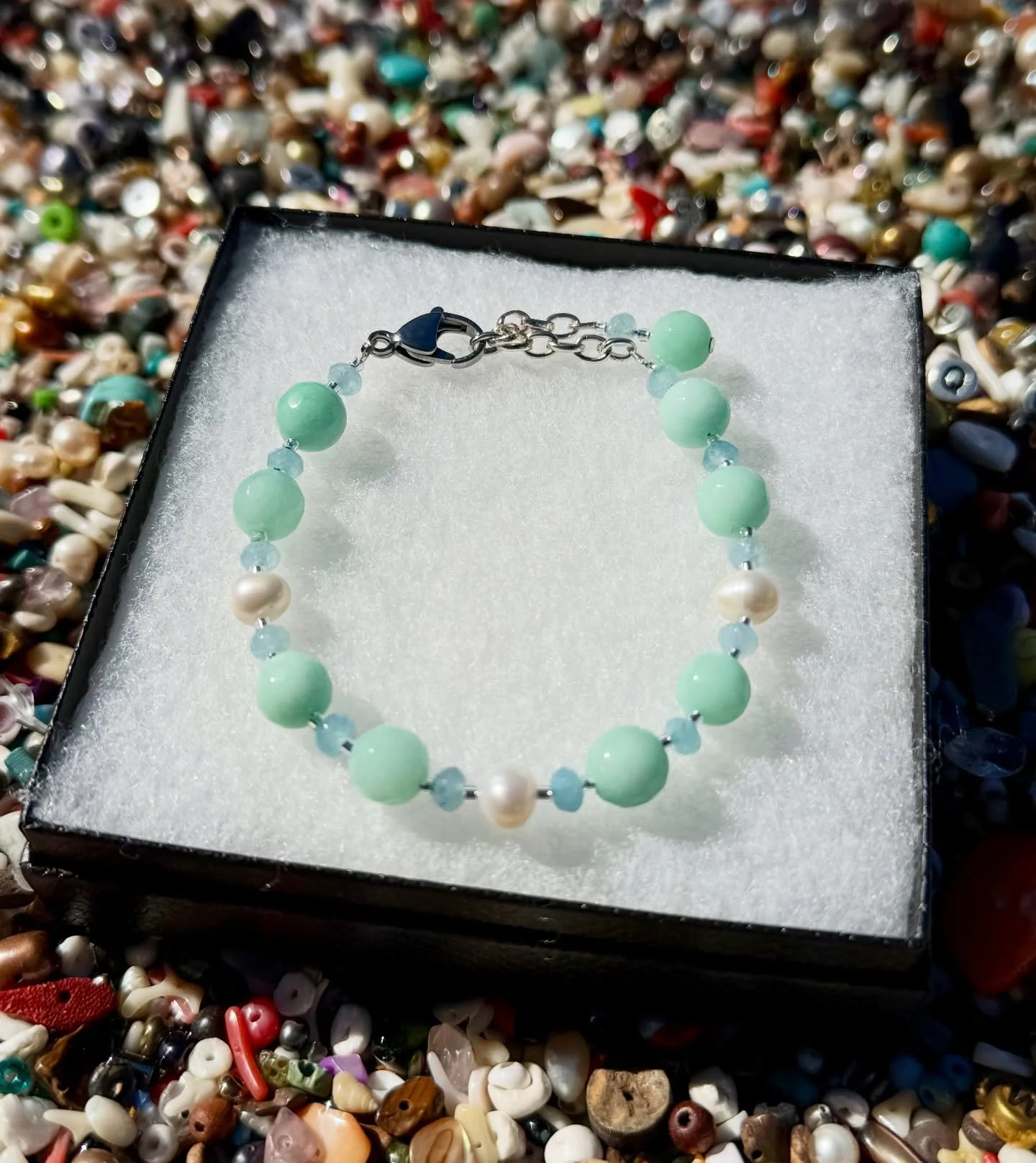 It&rsquo;s a beautiful day out here in @abitasprings.farmersmarket 

We just finished making this beautiful one! Sea foam jade, aquamarine and white pearls 😍

#handmadejewelry #jadebracelet #aquamarinejewelry #pearlbracelet #islandsymbol