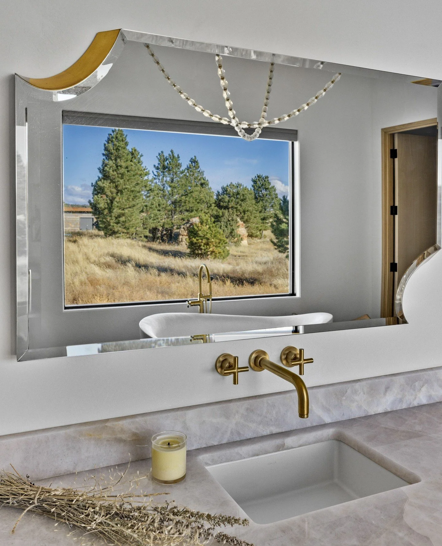 A primary bathroom suite designed to feel both grounding and elegant, with each detail thoughtfully aligned.