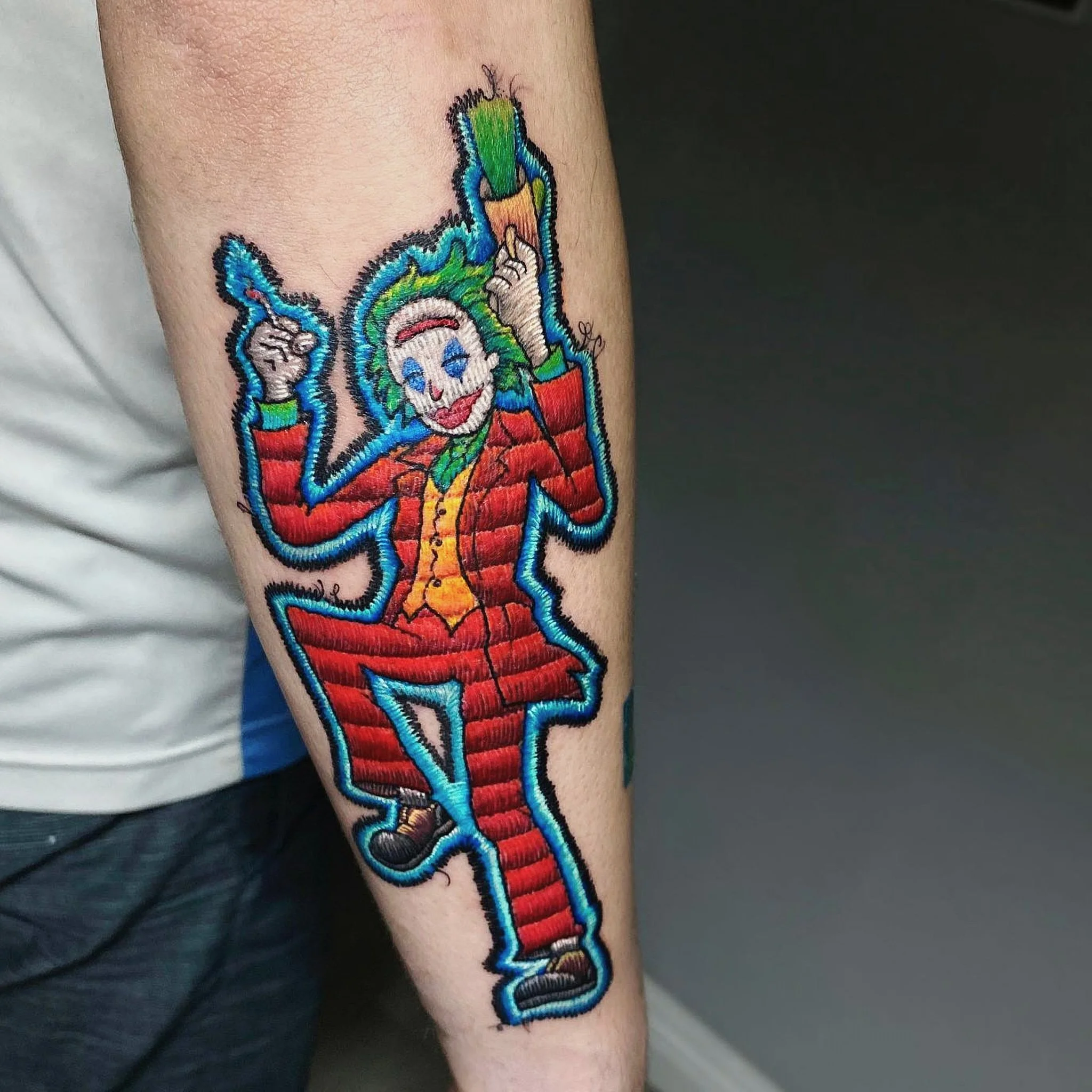 binx-artist-smiling-dancing-clown-embroidery-stitch-style-color-tattoo.jpg