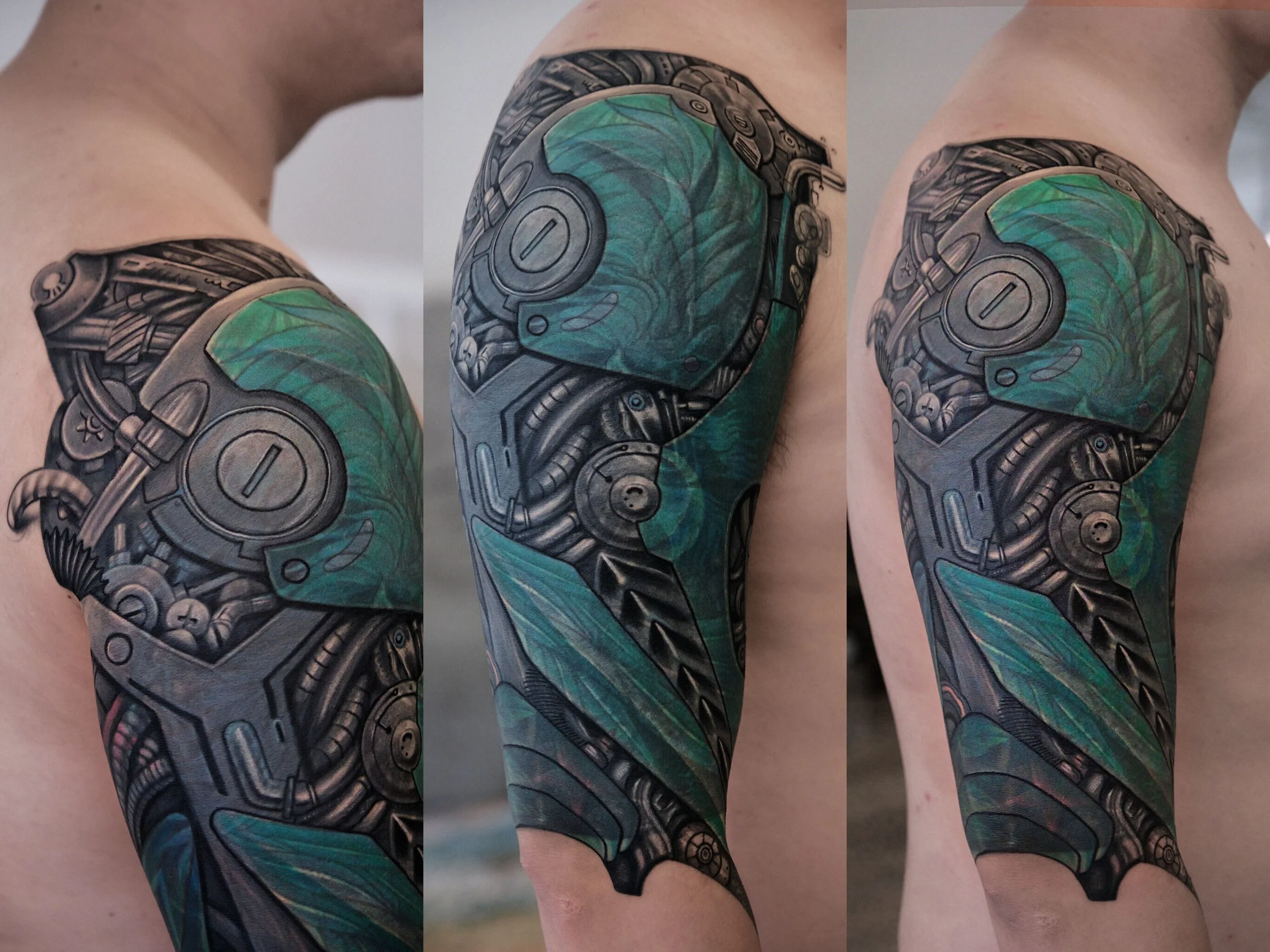 Intricate upper arm tattoo by Binx at Recycle Tattoo, blending mechanical and organic elements. This custom biomechanical piece features detailed black and gray shading accented with vibrant green hues, showcasing complex textures and a unique fusion