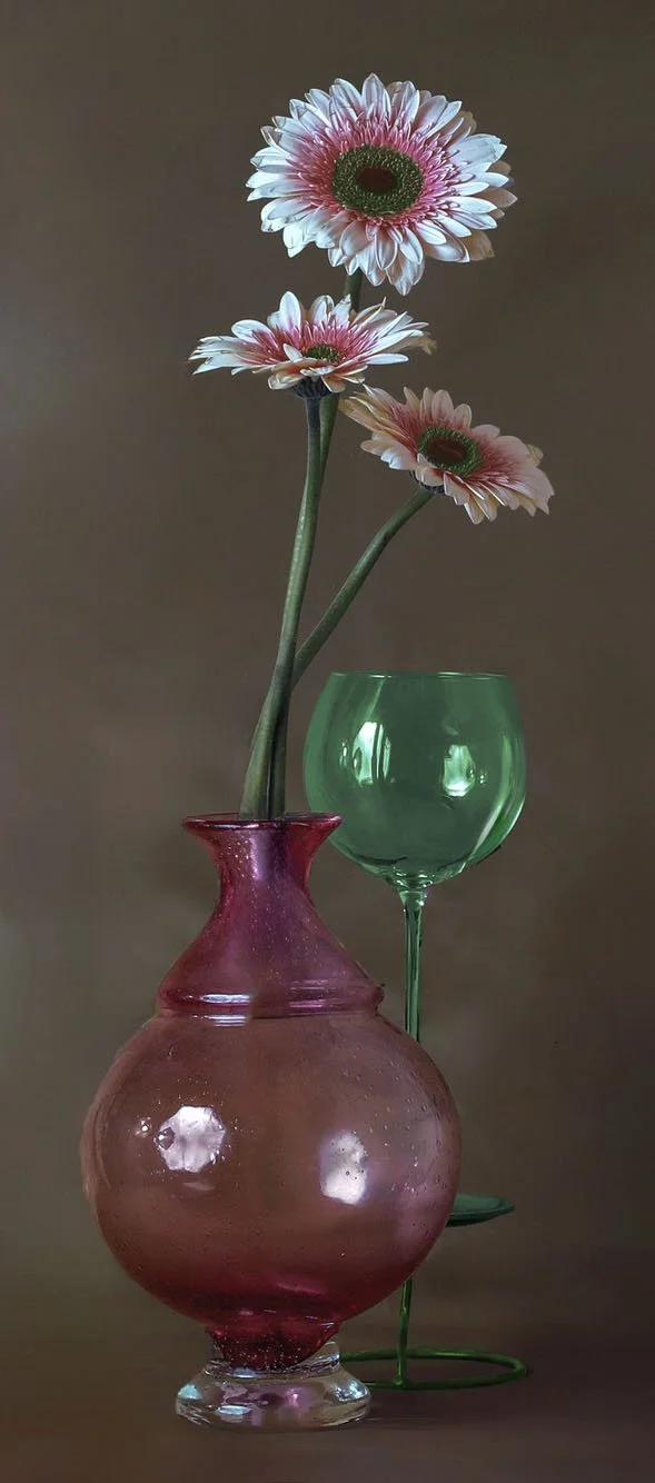 LS-00143Untitled (Three Red  and White Barberton Daisies on Mottled Warm Taupe Background) · Still Life · 2026