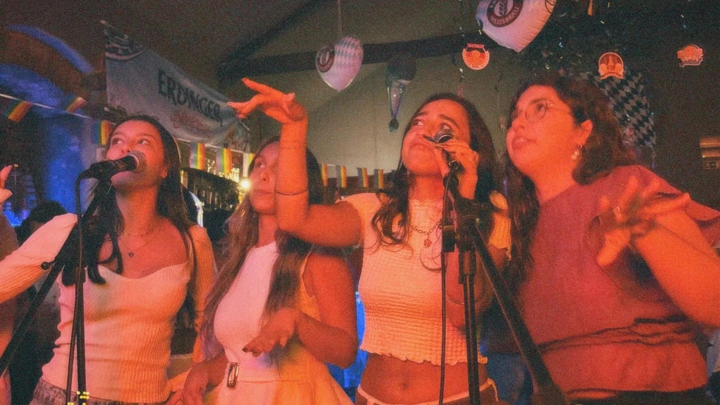 Group of girls sing karaoke