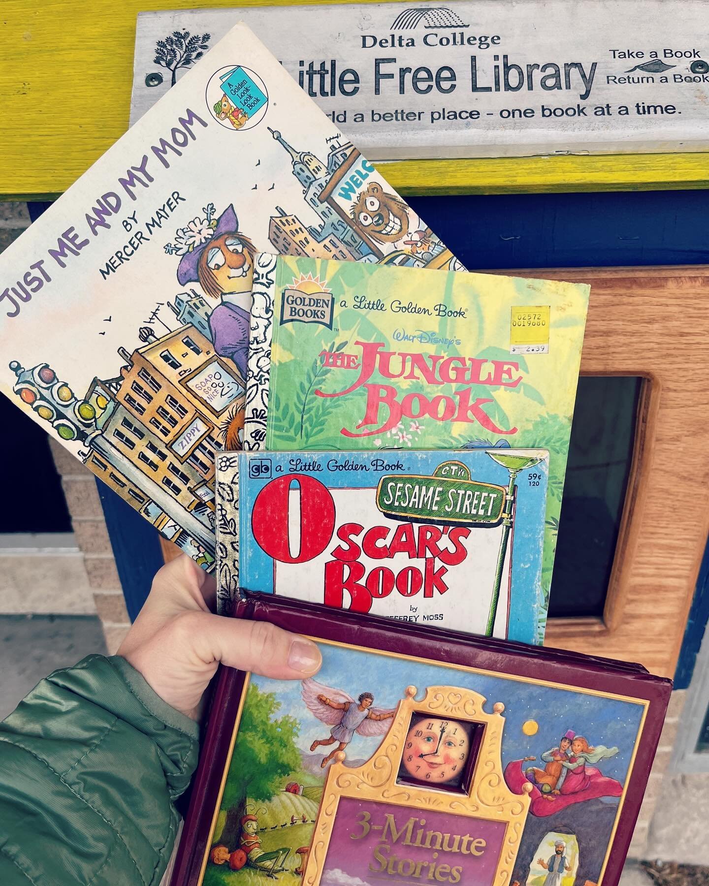 4 books were placed in the Little Free Library at Stone School: &quot;Little Critter: Just Me and My Mom&quot; by Mercer Mayer was donated by Karen Ott 🩷; &quot;The Jungle Book&quot; by Walt Disney, and &quot;Sesame Street: Oscar's Book&quot; by Jef