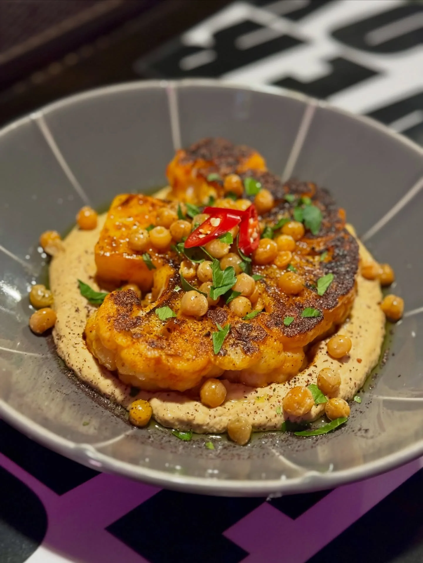 NEW ✨
Harissa Cauliflower Steak 🌱
Charred. Spiced. Comforting.

On house hummus with crunchy chickpeas, EVOO, sumac &amp; grilled pita.

Mary hates cauliflower and even she rates it 👌

Book your table via the link in bio.

#chapelstreet #windsorbar