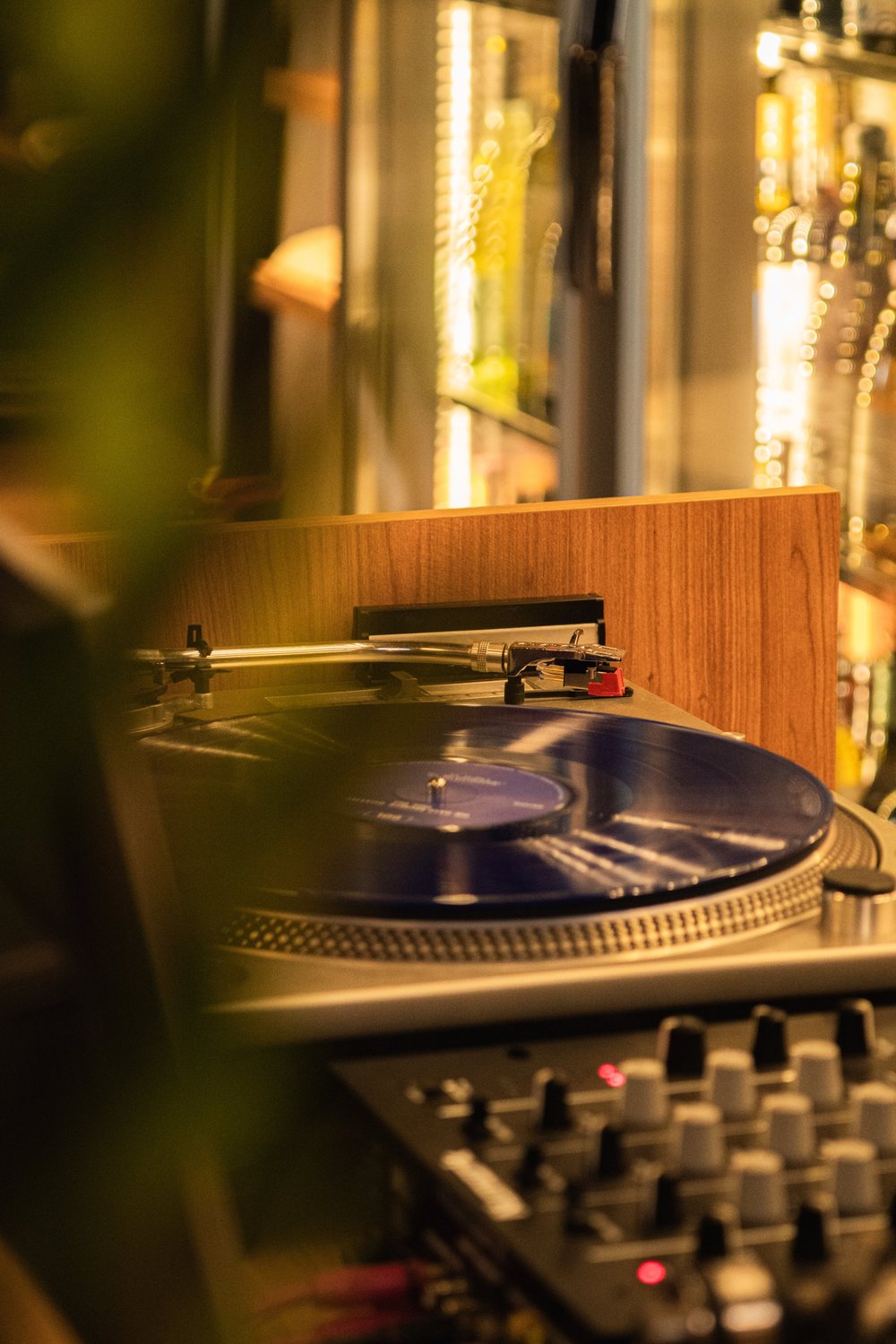 A turntable beside the window in Strafilo’s listening space.