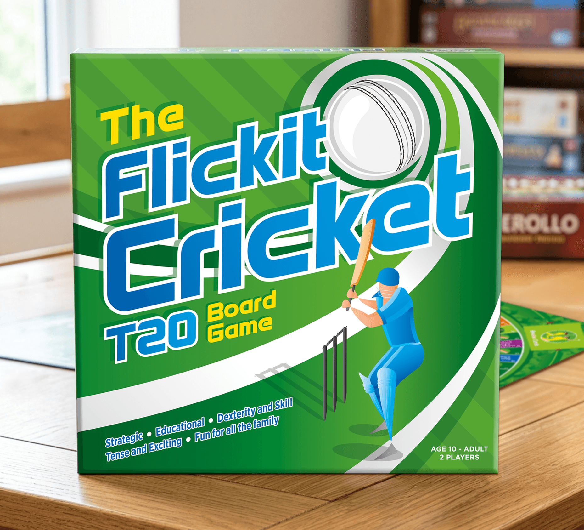 The Fickit Cricket T20 Board Game box with a figure holding a cricket bat, and text indicating it is for ages 10 and up, suitable for two players, a strategic, educational, and fun game.