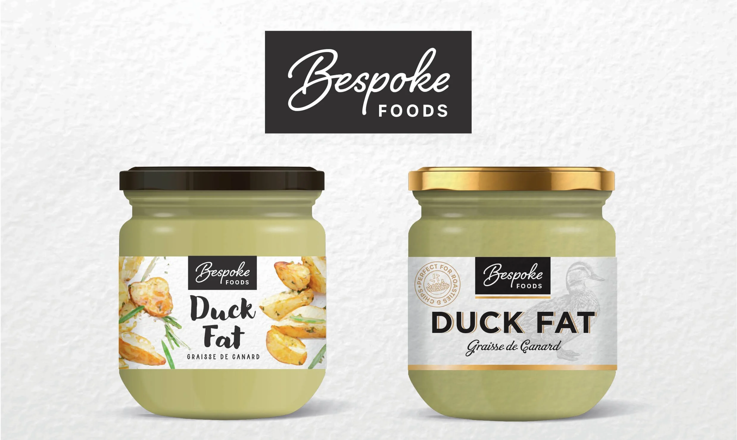 Two jars of duck fat from Bespoke Foods, one with a black lid and the other with a gold lid. Label on the left featuring watercolour crispy roast potatoes and rosemary. Right label has a tinted duck image on a white background with text over the top.