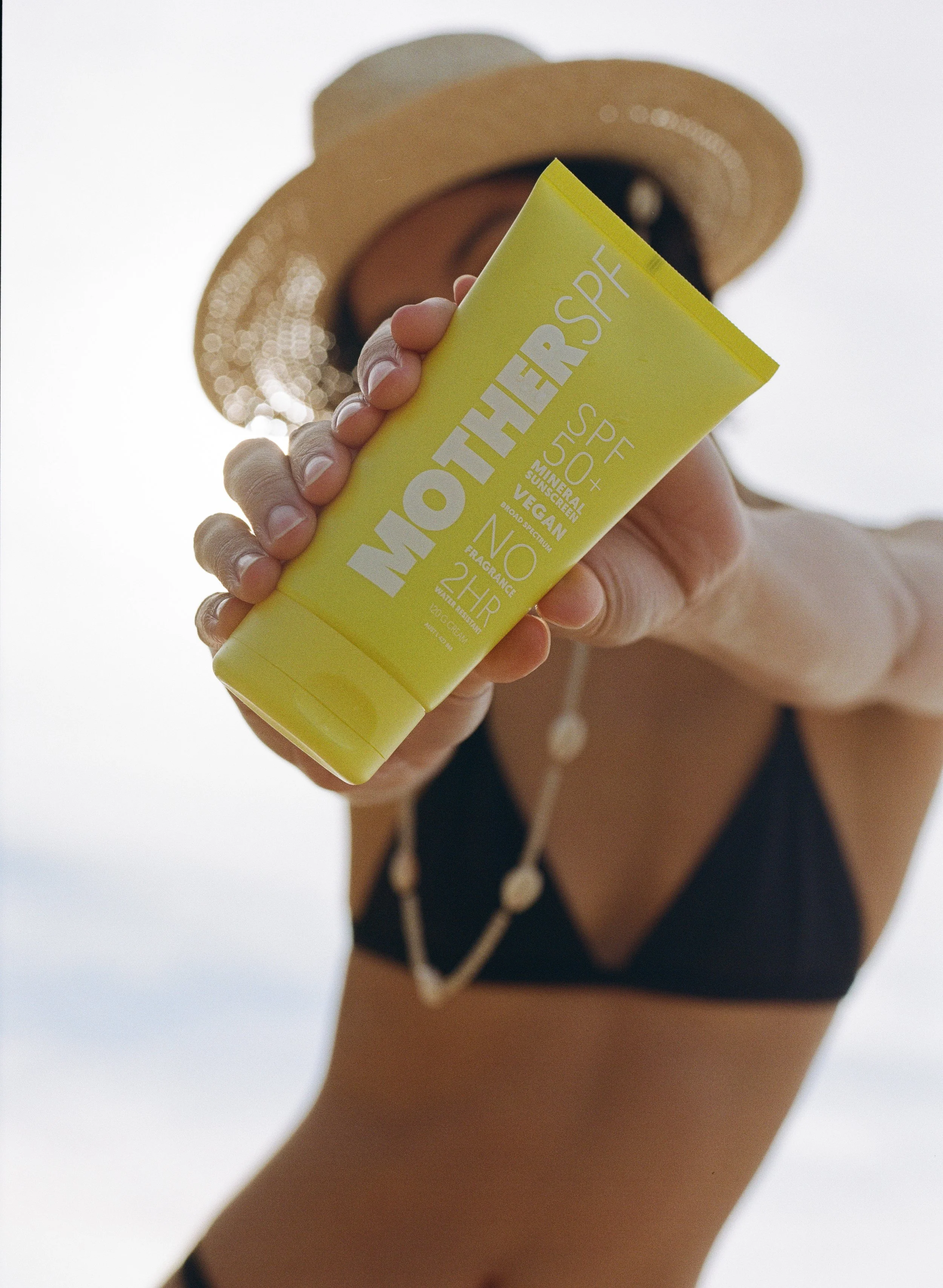 mother spf face and body with woman in background.jpg