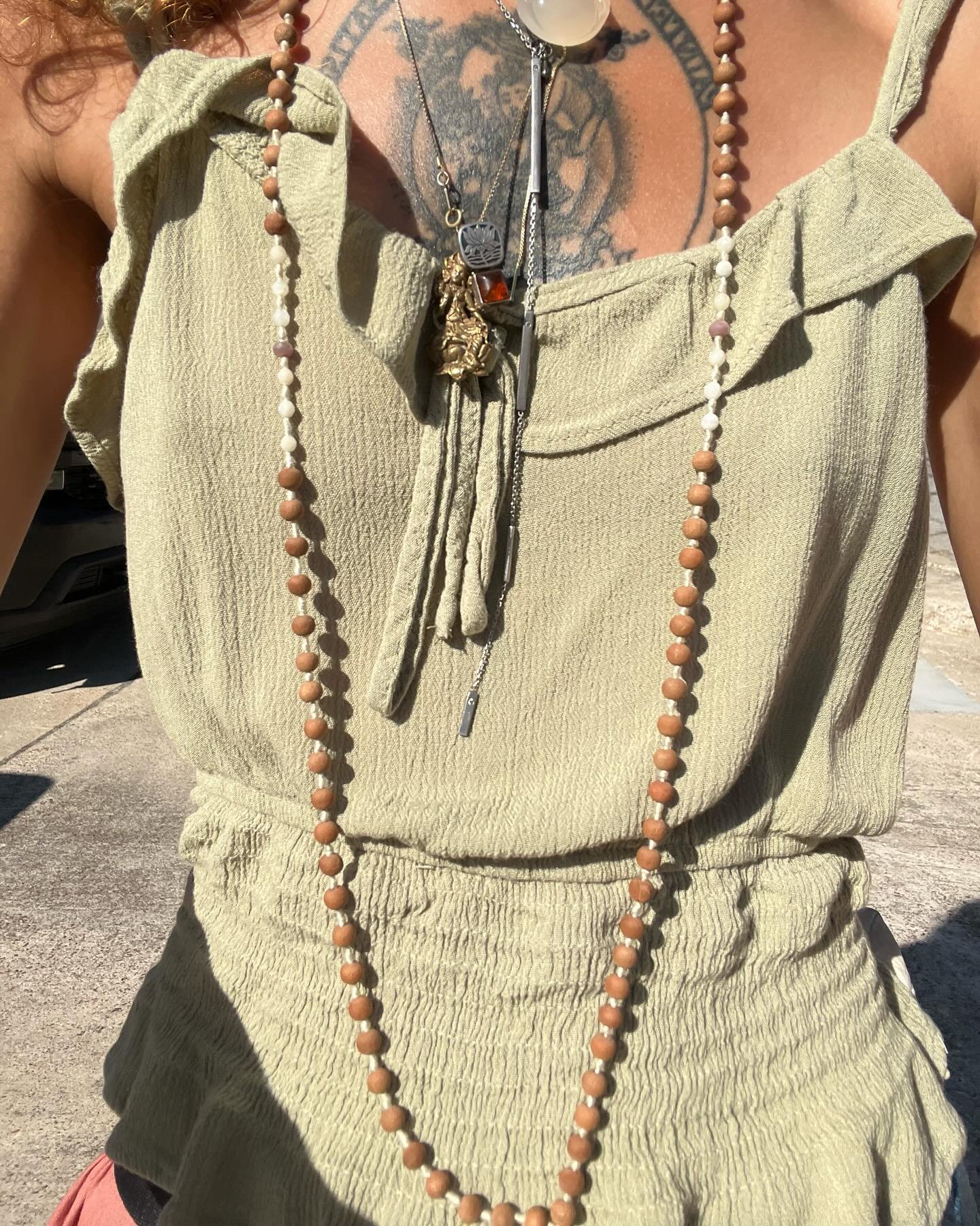 Chonky devotional layers 🤍

This is a custom mala I made for myself, it includes sandalwood from Nepal, India, moonstone and garnet.