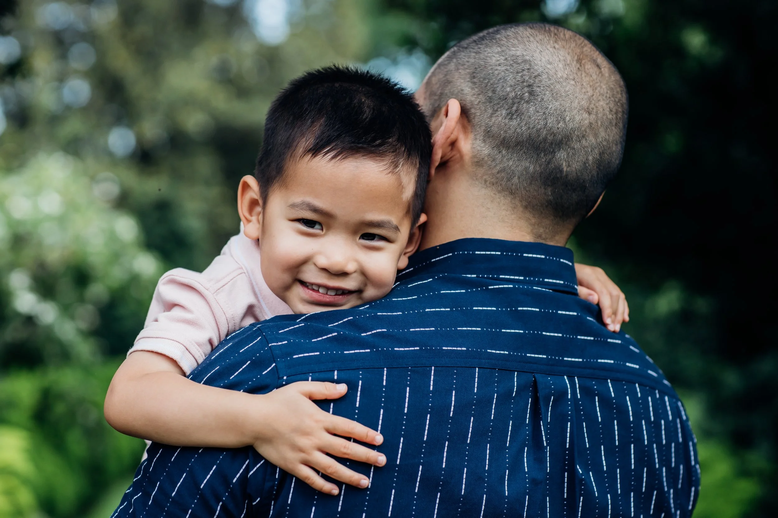 Boy hugging dad