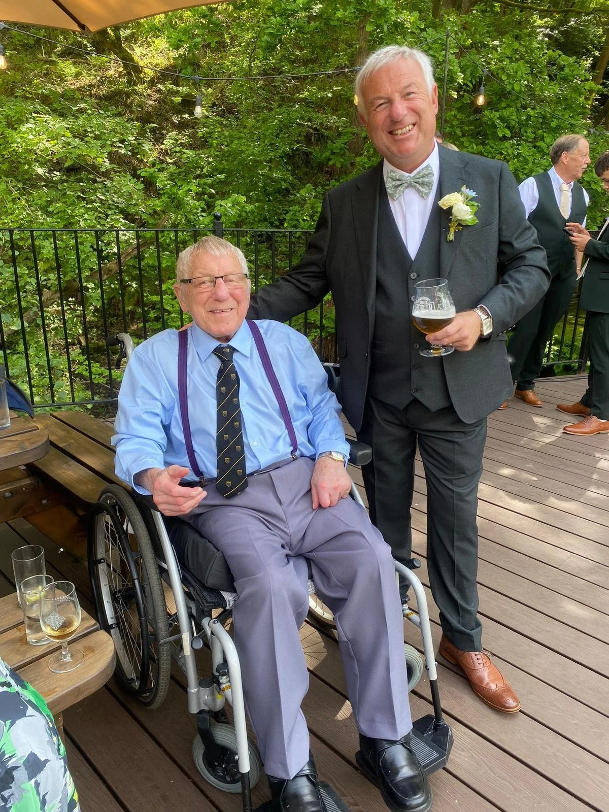 Father of the Bride spending quality time with his father, the Brides Grand father , supported by a professional event carer