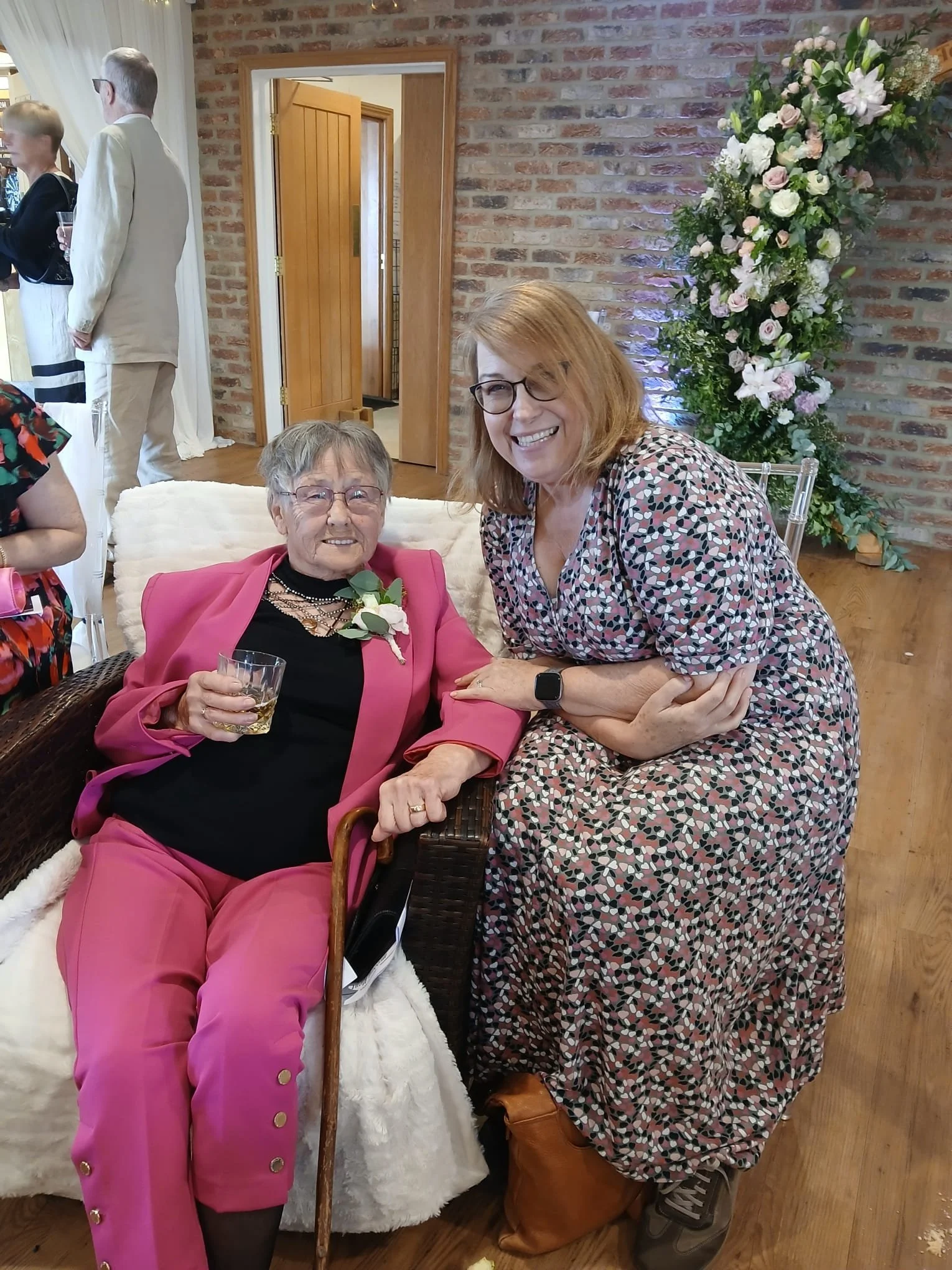 Loved Nana with dementia enjoying some quiet time being supported by event carer professional