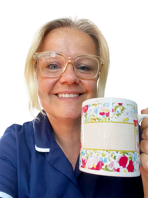 A woman with glasses holding a microphone, speaking or performing.