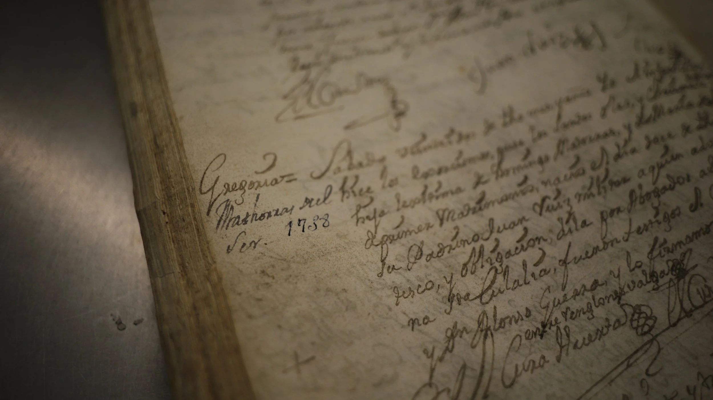 Black-and-white photograph of an older man with white hair and a mustache, dressed in 19th-century formal attire with a cravat and coat, looking serious.