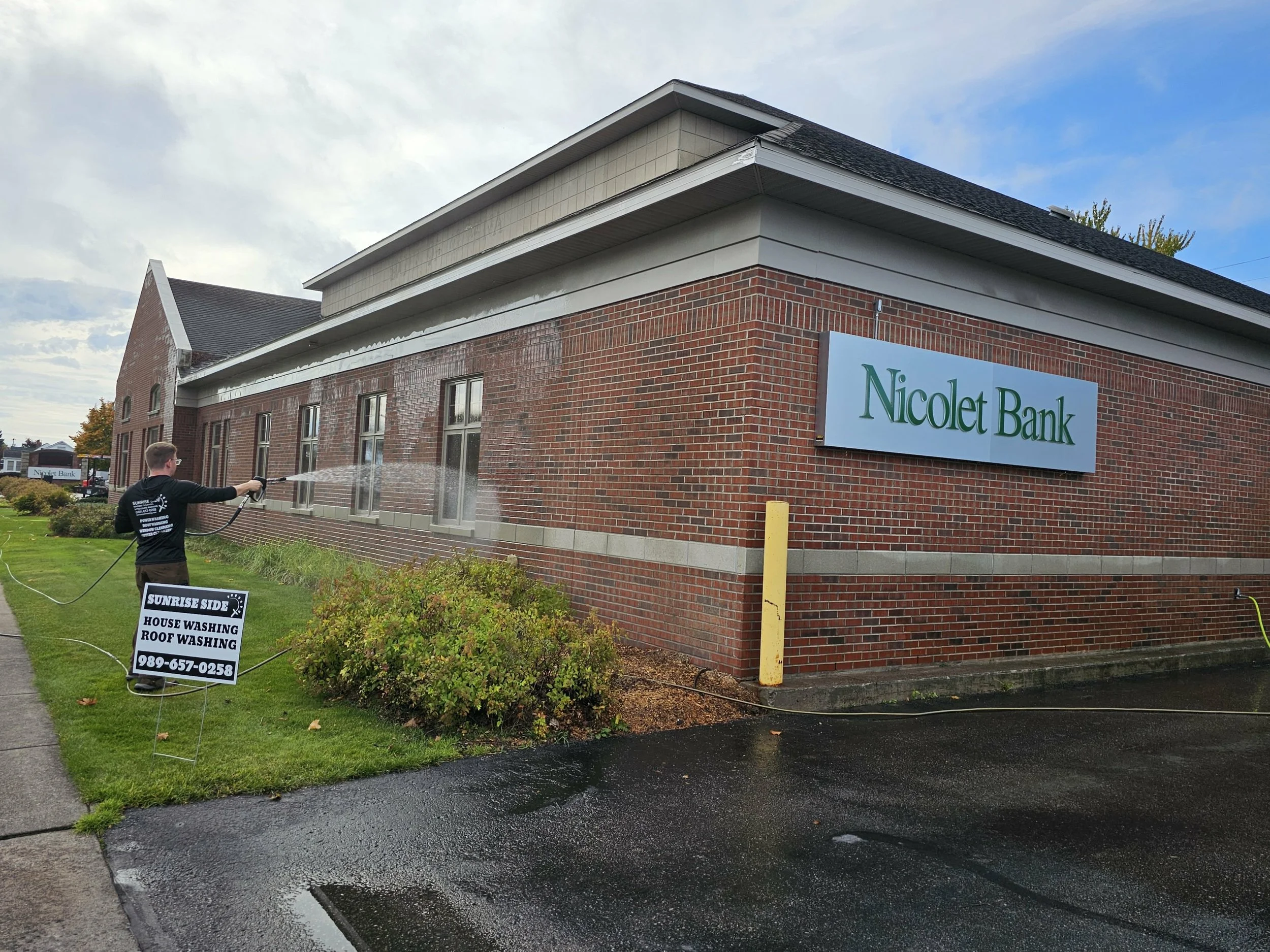 Exterior brick cleaning of Nicolet Bank, Alpena Michigan