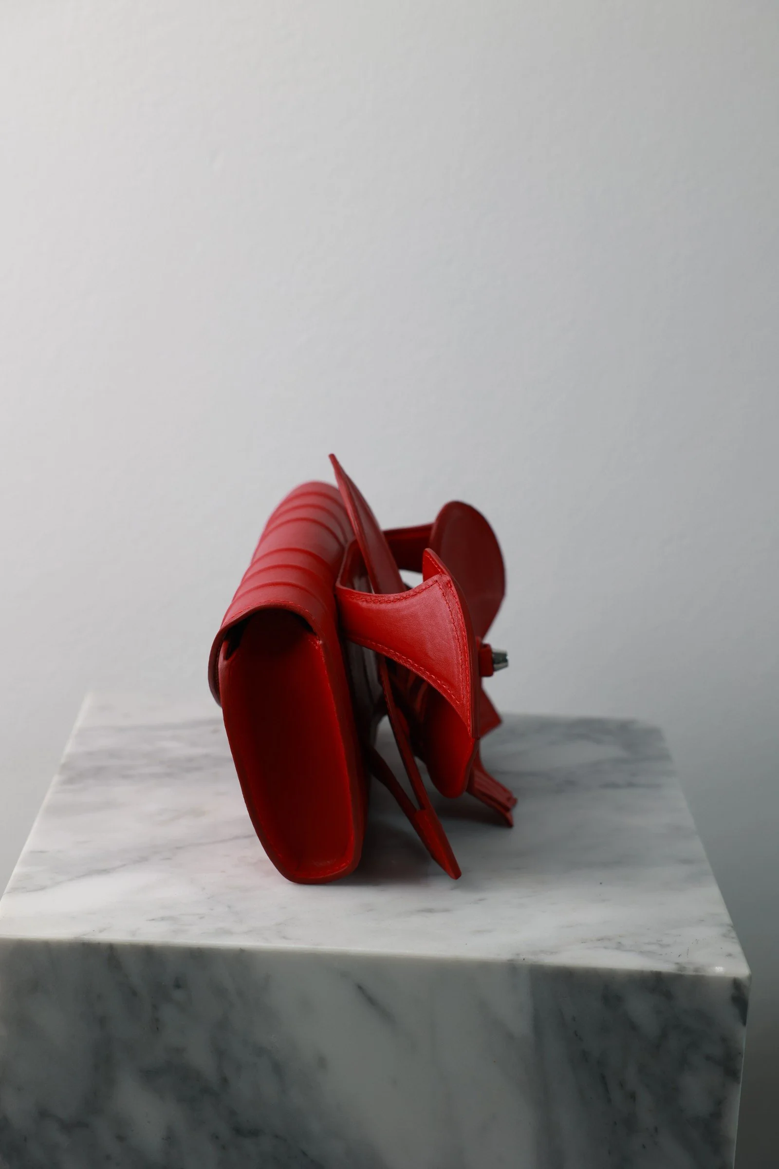 Orchid Clutch by YS Atelier: side profile showing the depth of the sculpted petals