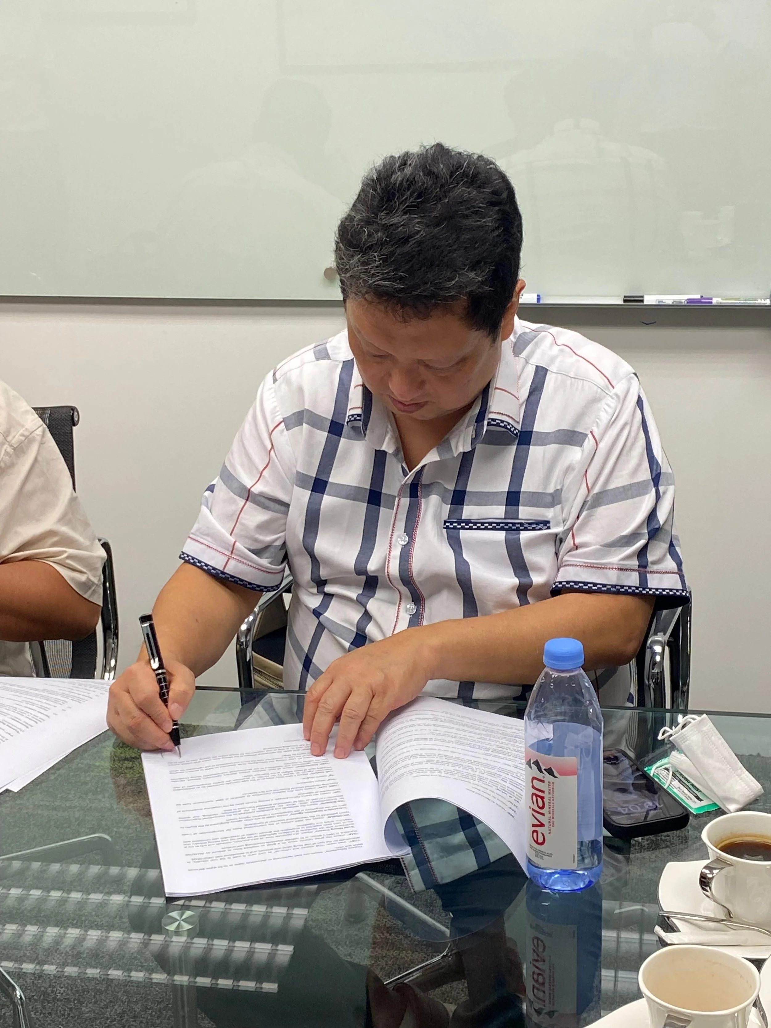 Pak Raymond contract signing.jpeg