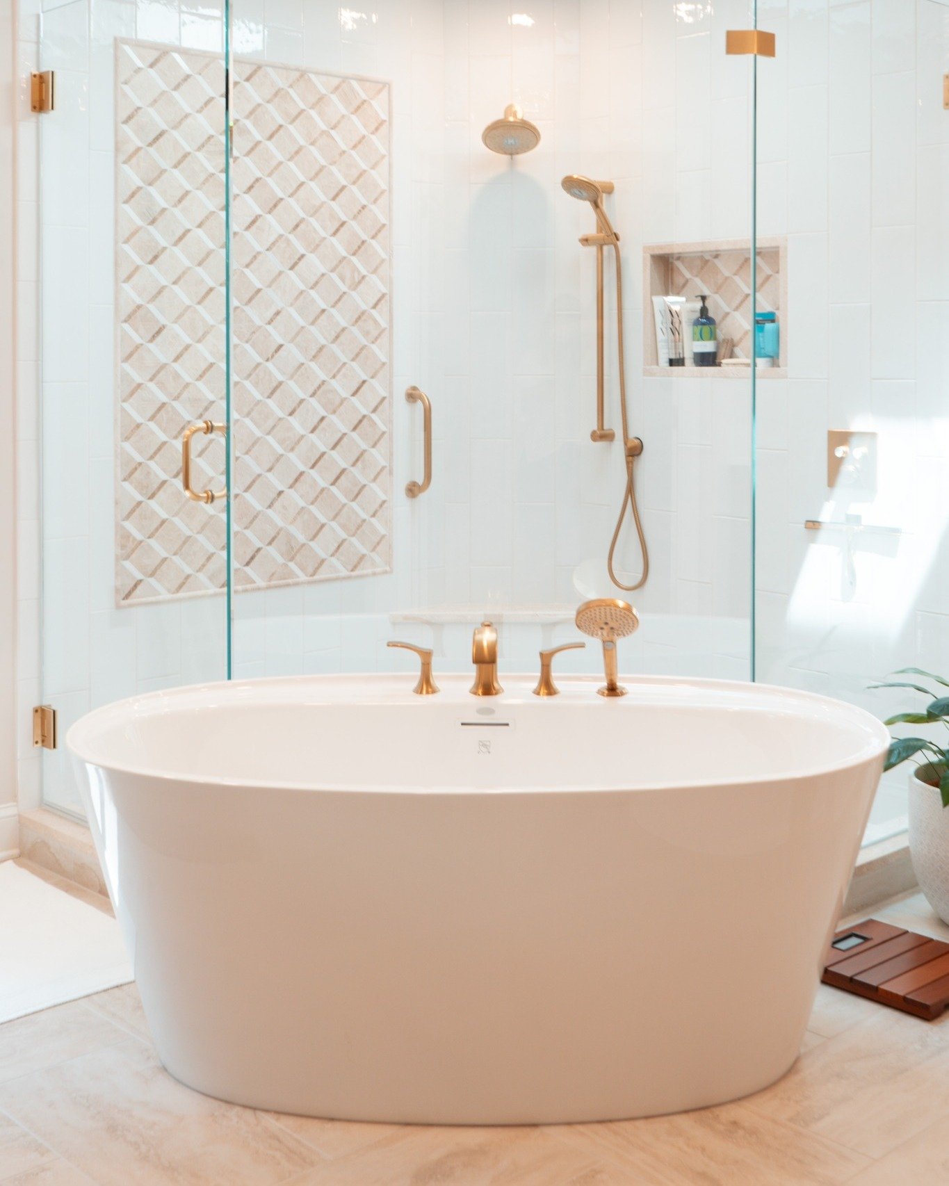 We&rsquo;re still dreaming about this bathroom 💭 Every detail&mdash;from the freestanding tub to the gold fixtures built for pure relaxation and timeless style.

🛁 Spa-like comfort
✨ Elegant finishes

#BathroomGoals #CustomBathroom #LuxuryBath #Spa