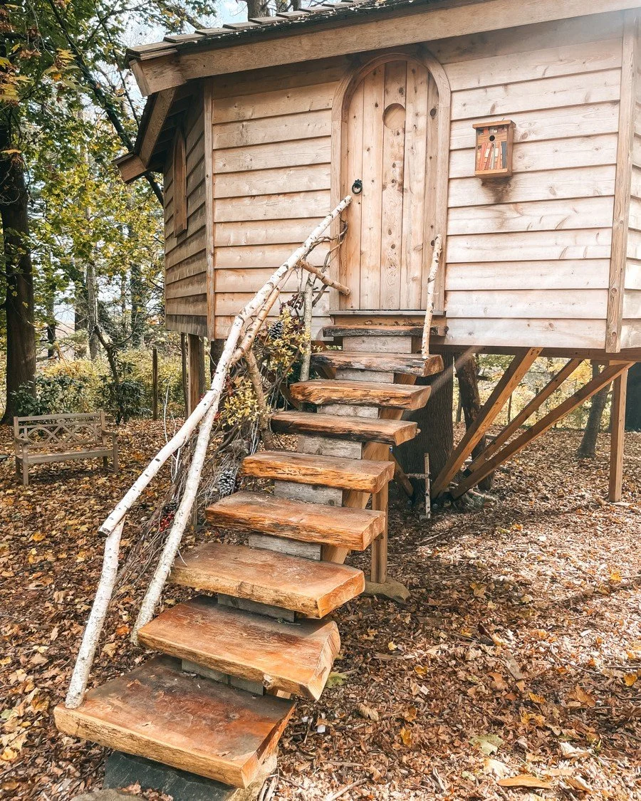 Somewhere between summer and fall, magic happens. ✨ This one-of-a-kind treehouse &mdash; complete with a hollowed-out slide &mdash; feels straight out of an adventure tale. One of our all-time favorite builds with @wc.woodworks
