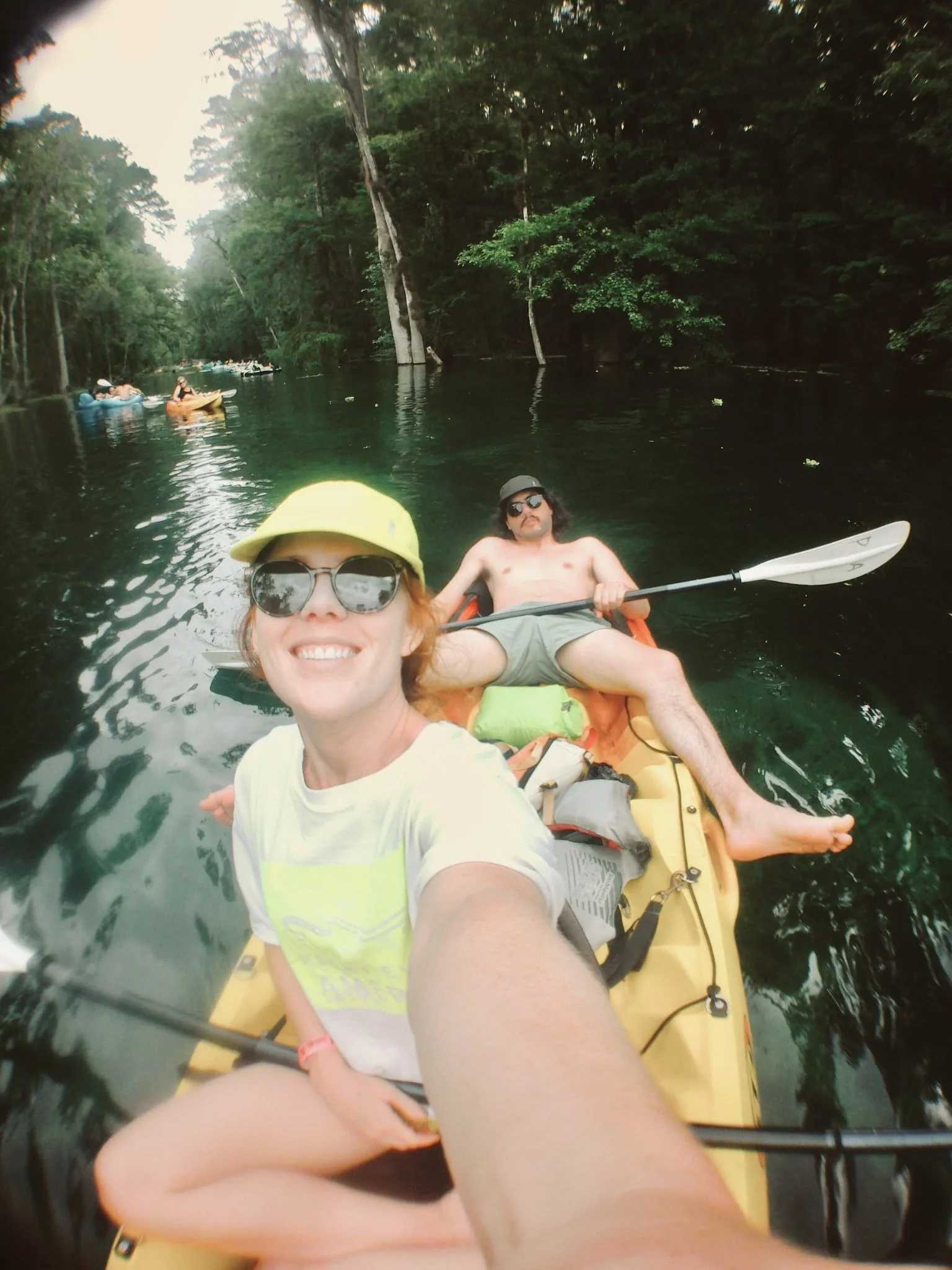 Kayaking with manatees in Ichetucknee Springs, Florida after Kyle proposed at the Blue Hole (a natural underwater cave that feeds the springs)