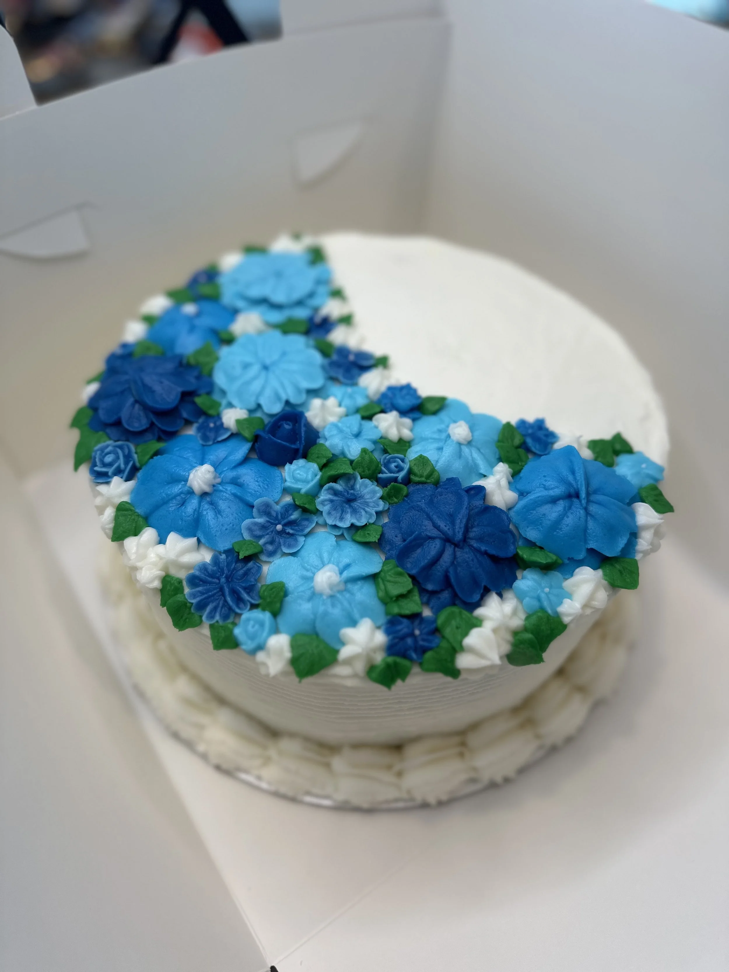M&M Bakery Blue Flower Cake.jpg