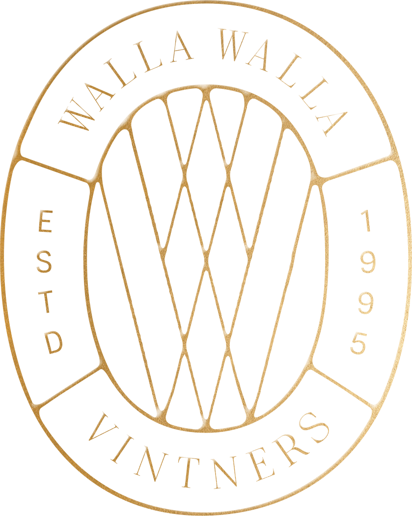 A gold and purple Volkswagen logo with a circular design.