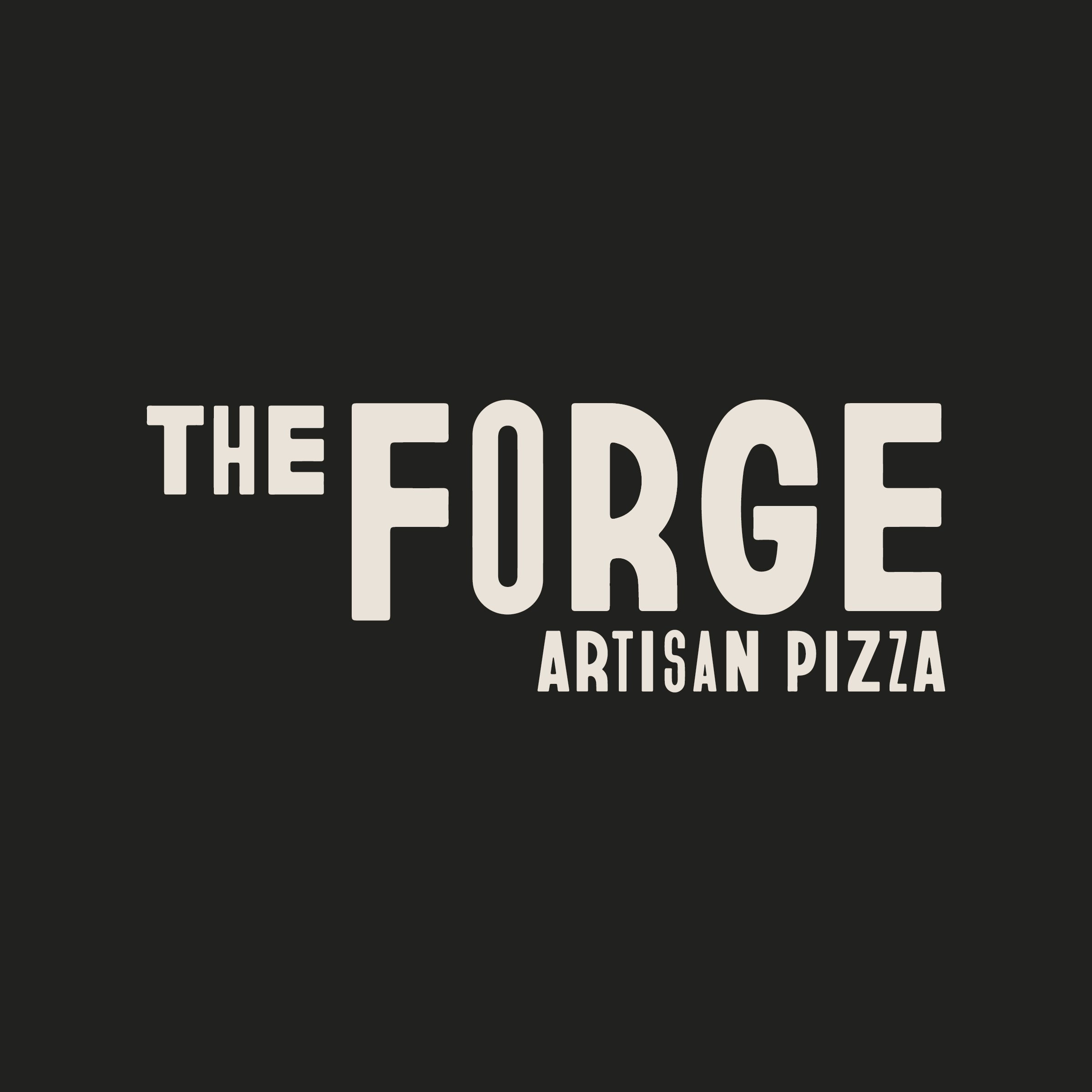 Close-up of a sign reading 'THE EDGE' with additional text below that says 'ARTISAN PIZZA'.