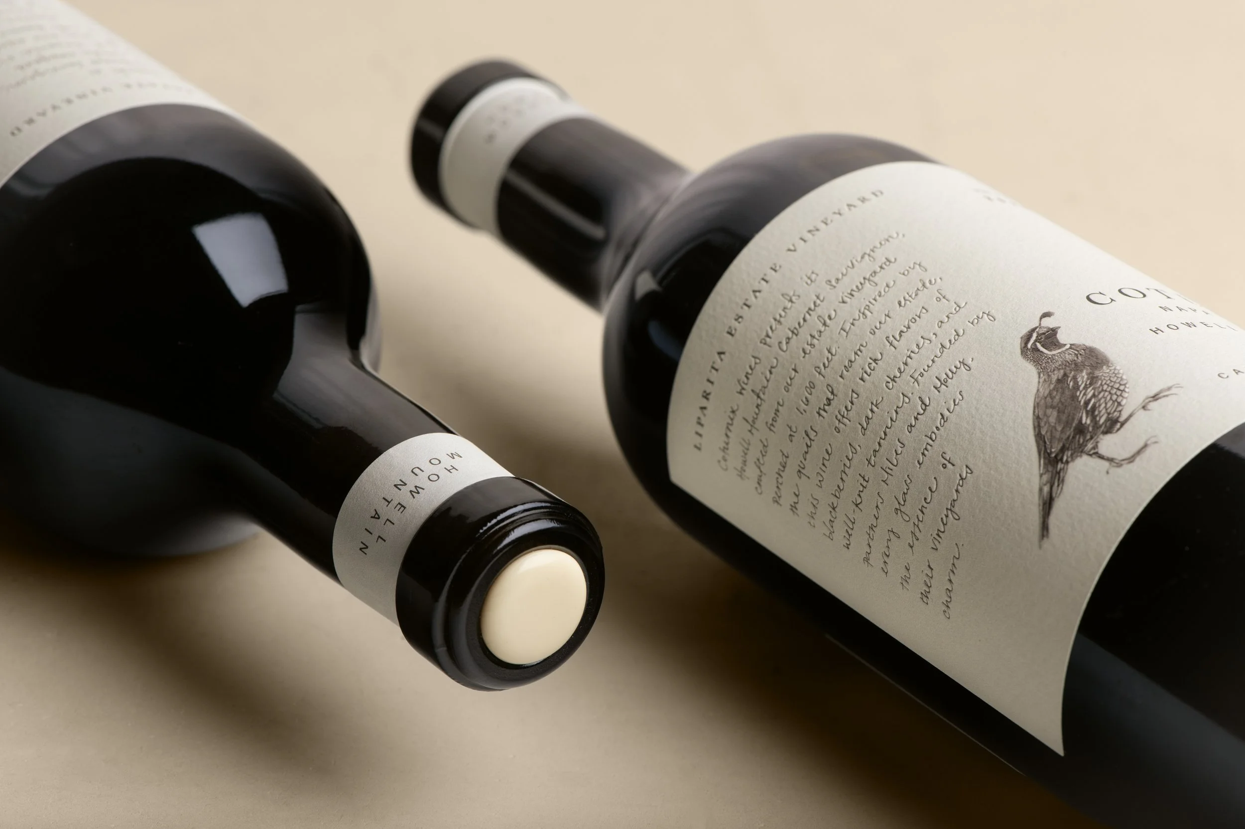 Multiple bottles of Coturnix wine showcasing details of labels