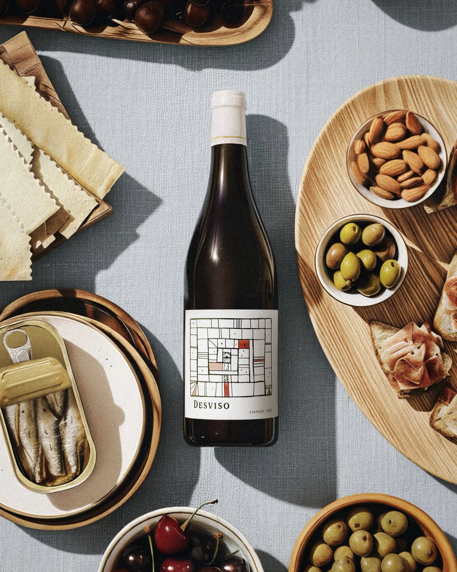 Desviso wines flatlay featuring castelao label and charcuterie
