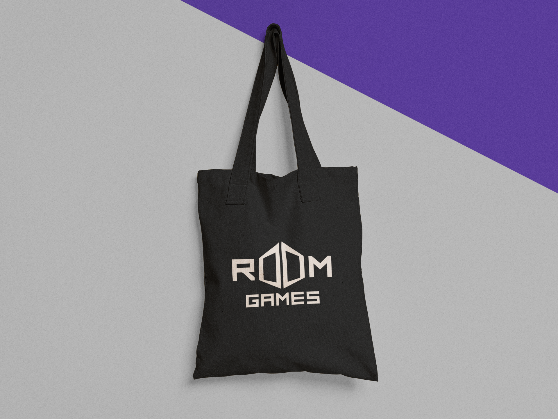 tote-bag-mockup-hanging-from-a-nail-on-a-two-colors-wall-a15313.png