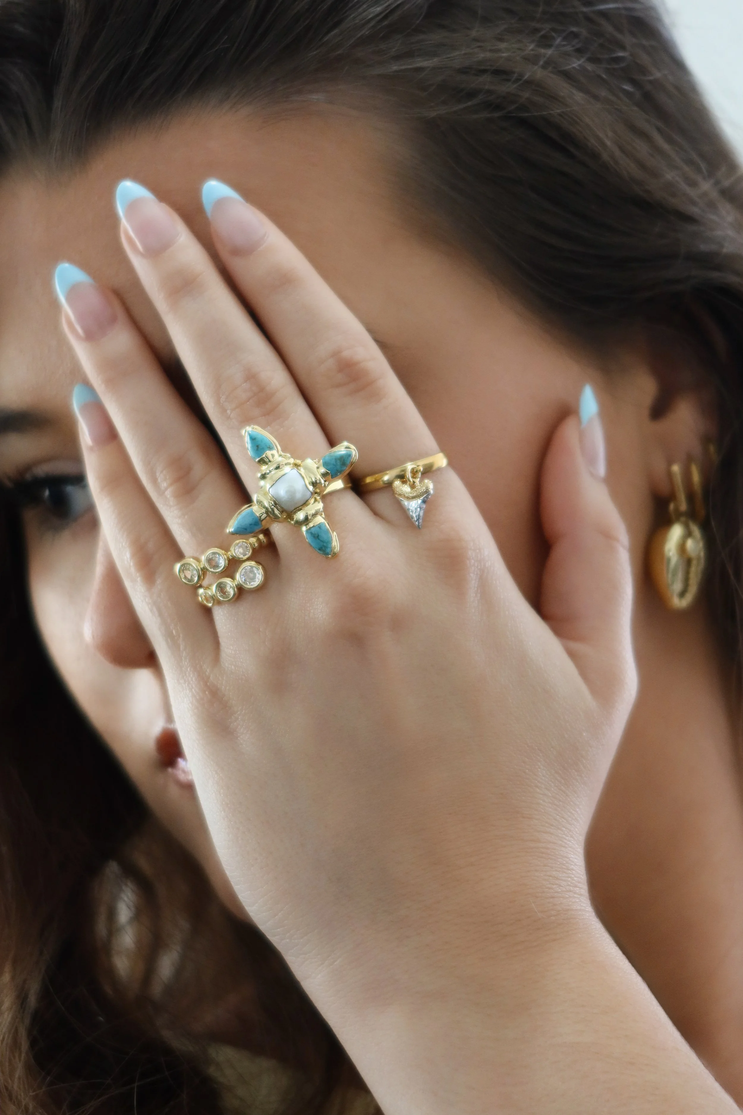 catalina and palmona rings on.jpg