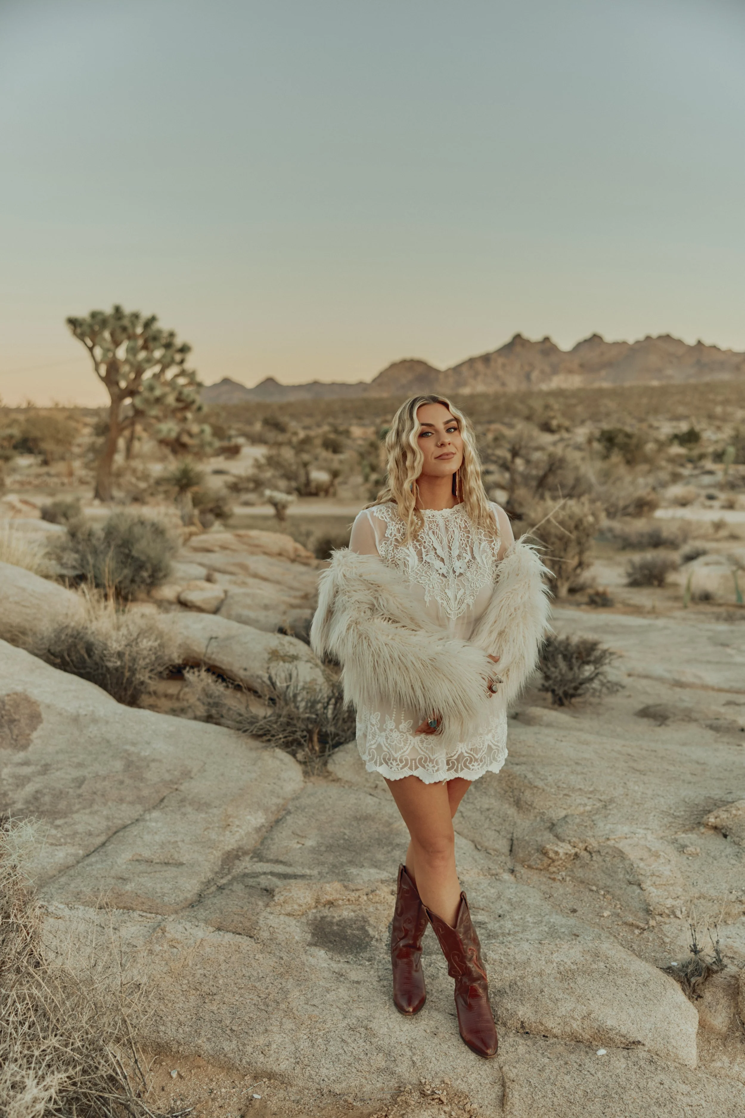 Taj standing in warm desert light in Joshua Tree