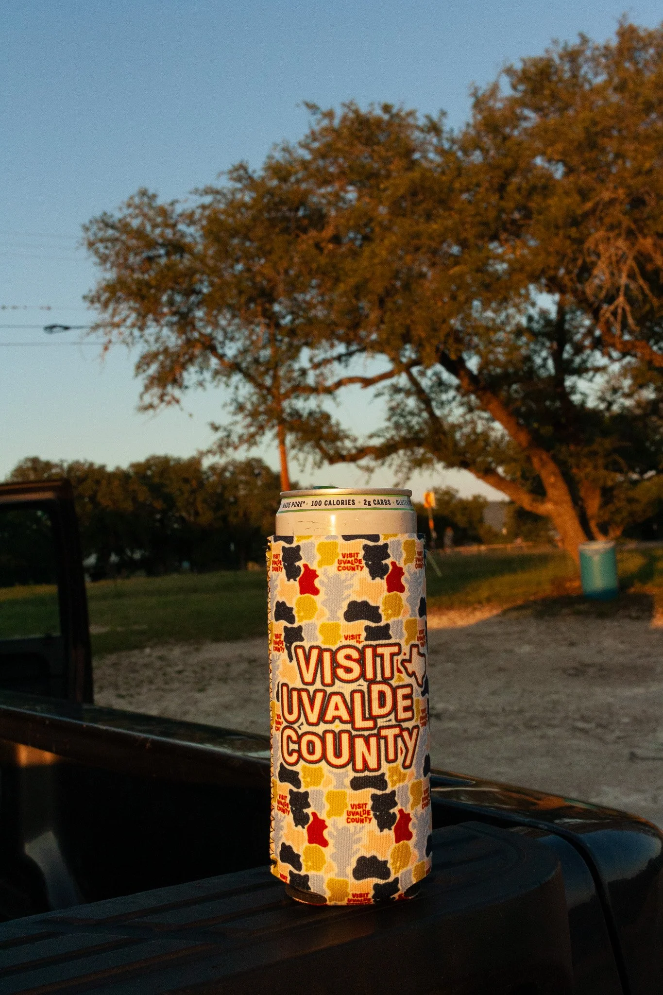 Can inside of a koozie that reads "Visit Uvalde County" - xTexas Trail Association