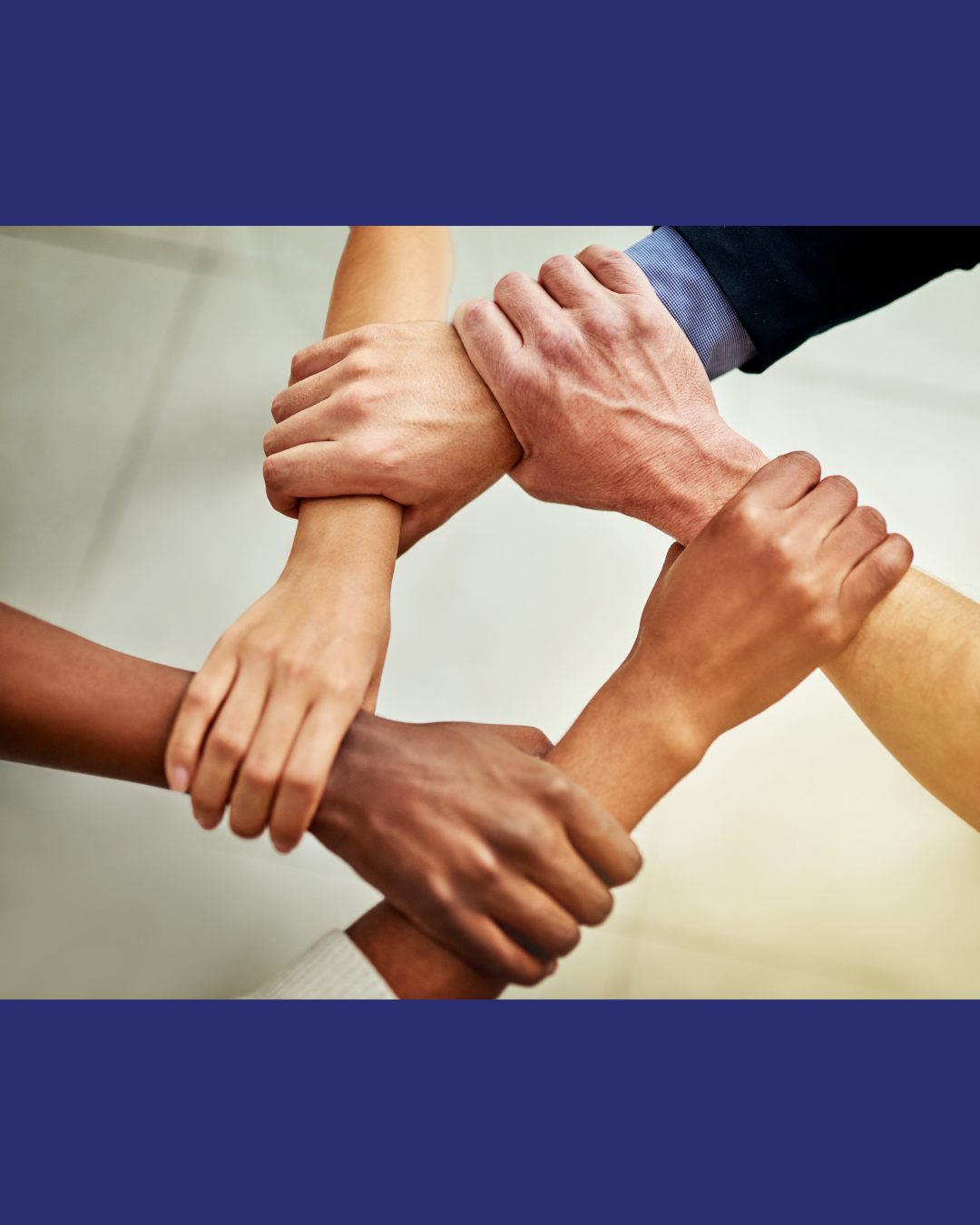 5 hands clasped in a circle