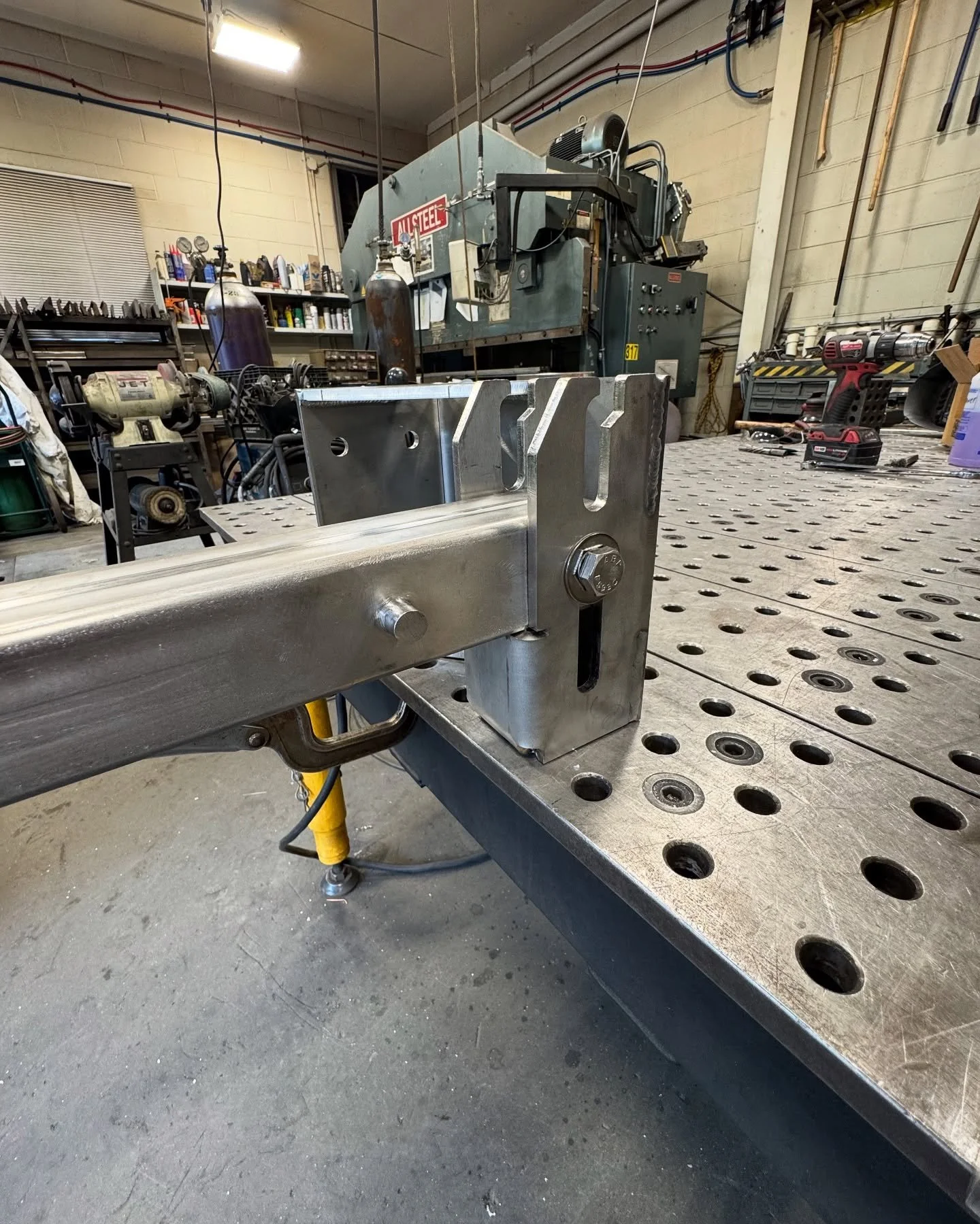 Check out this stainless brackets that we designed and fabricated. These are part of a collapseable fall protection system!
