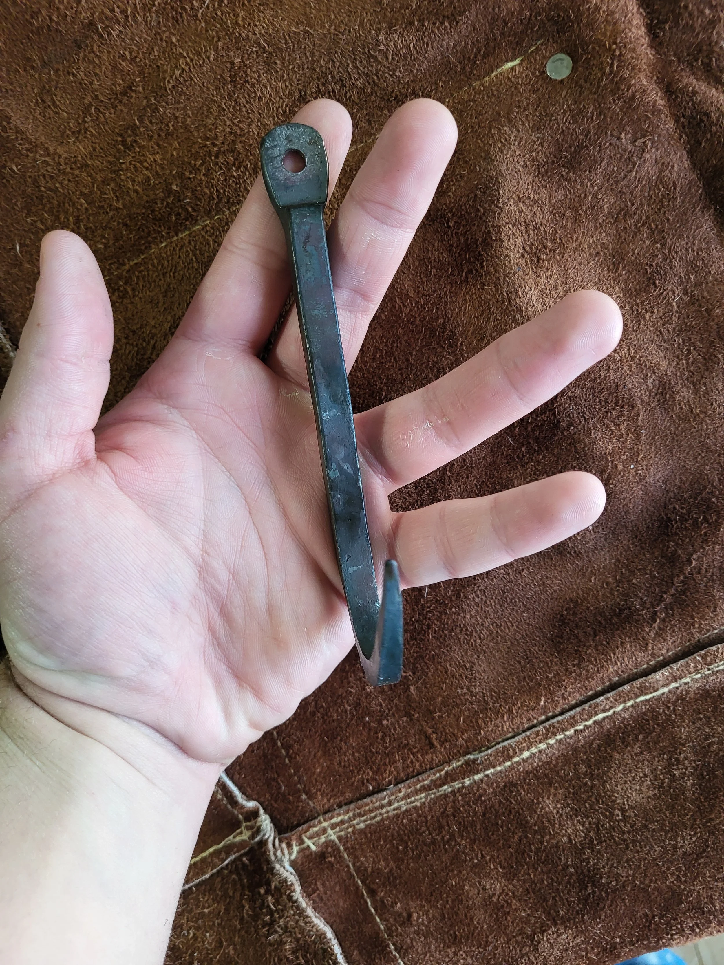 Hand-forged-j-hook-in-hand