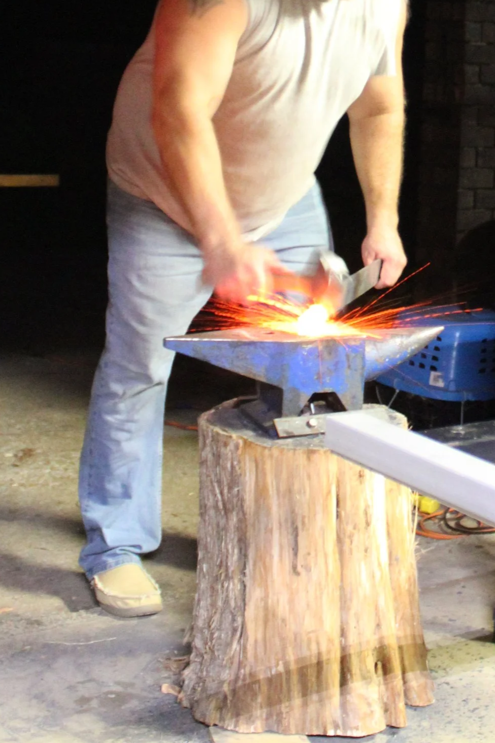 blacksmith-hammering-knife-tang