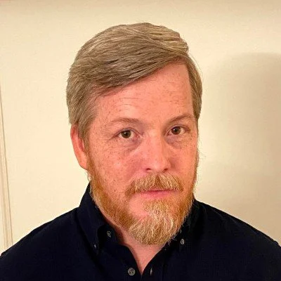 Professional headshot of Daniel Burnett, CEO of THeranova LLC.