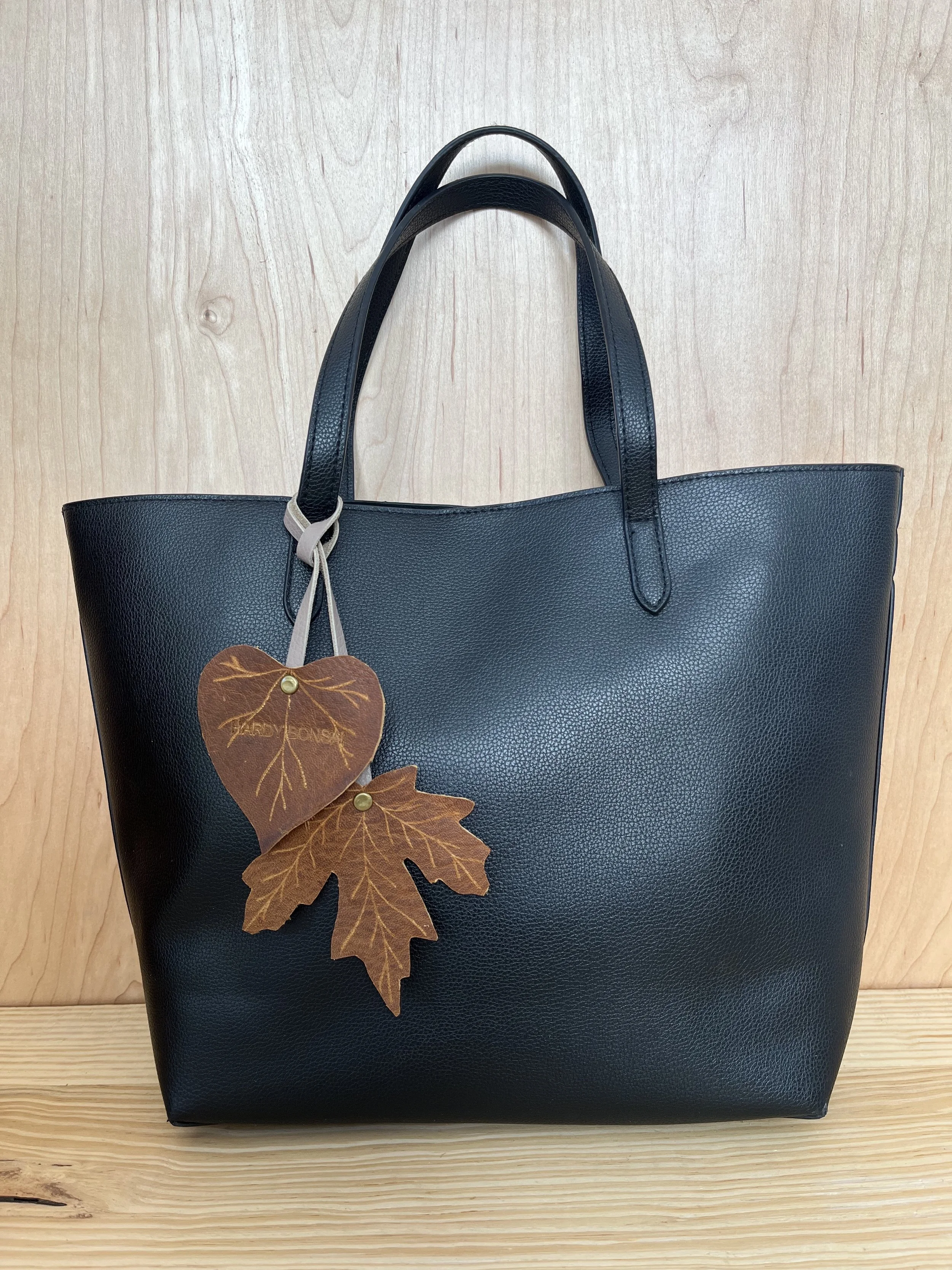 TX leaf charm gray.jpg